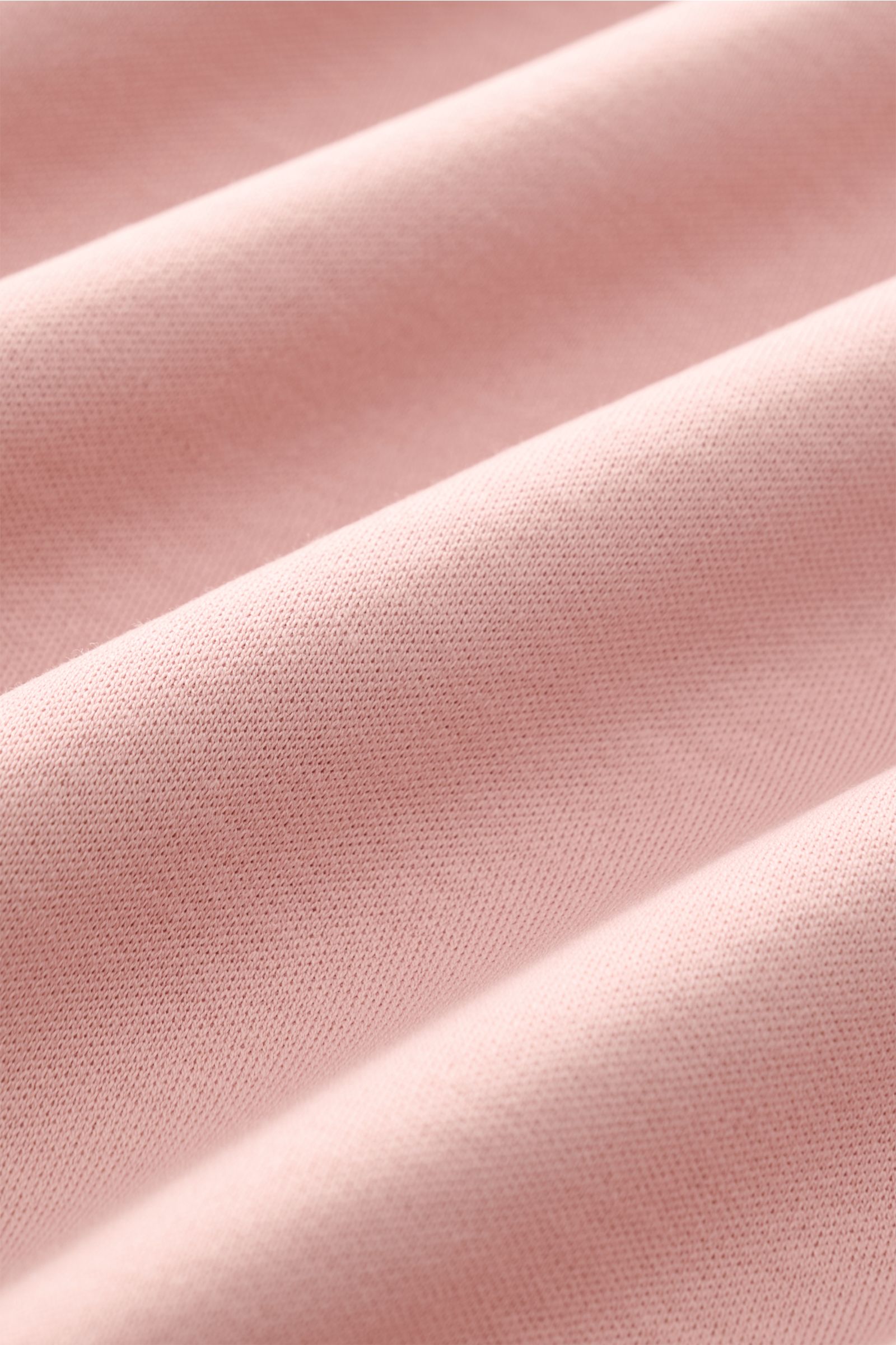 Close-up front view of fabric texture in antique pink showing soft cotton knit of Aurélien Crew neck T-shirt antique pink, a versatile basic for spring and summer: This T-shirt by AURÉLIEN combines high-quality cotton with a clean, timeless design. Pure c