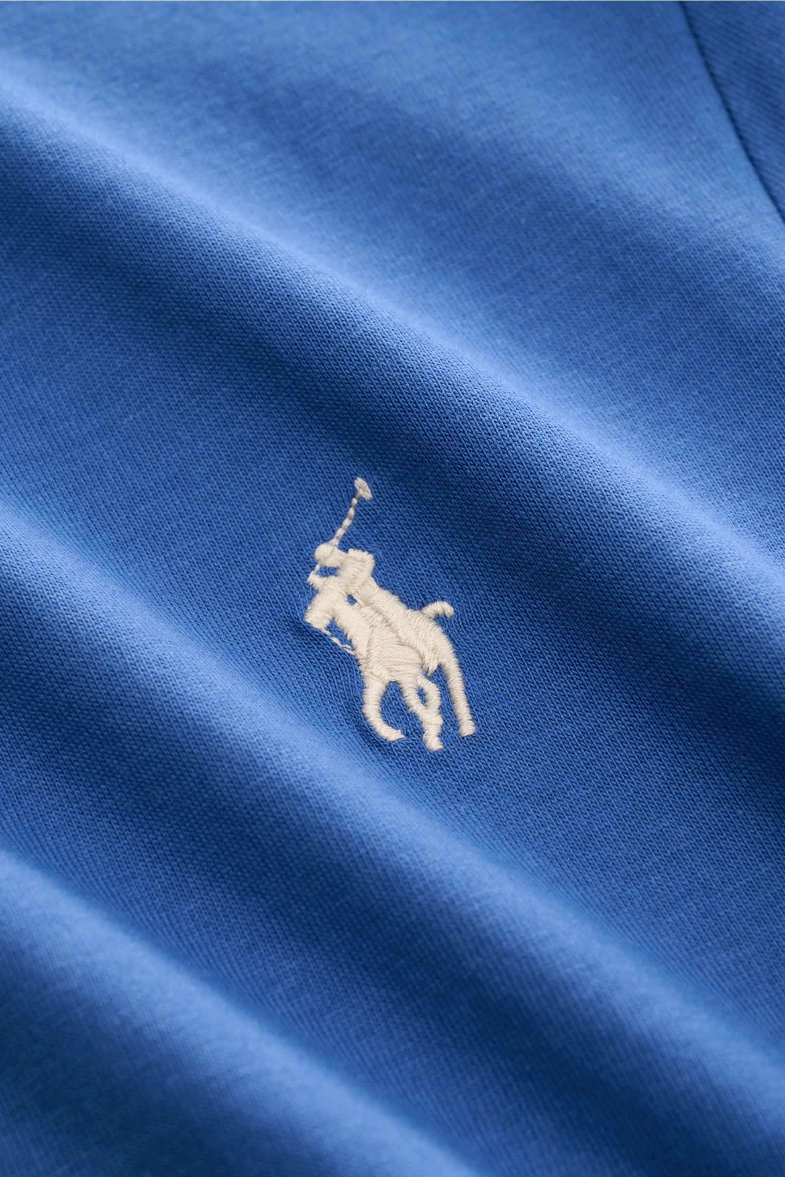 Close-up front angle of Polo Ralph Lauren Crew neck T-shirt dark blue showing soft cotton fabric and signature logo stitching.

A sporty classic: This soft T-shirt in pure cotton by POLO RALPH LAUREN combines the iconic logo stitching with a slim silho