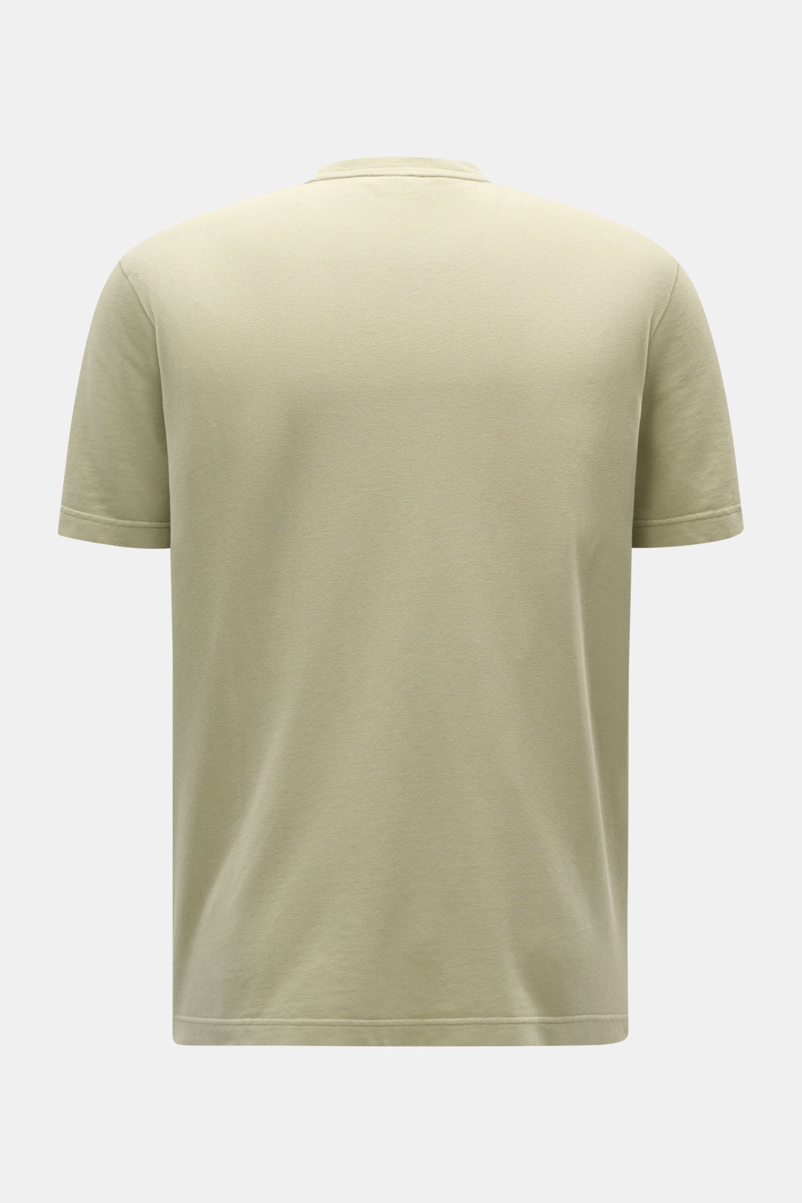 Back view of the 04651/ A trip in a bag Piqué T-shirt sage in soft green, slim fit with crew neck, pure piqué cotton, ribbed bands, and side seam label.

Summer essential: This piqué T-shirt from 04651/ A TRIP IN A BAG is a versatile staple that's perf