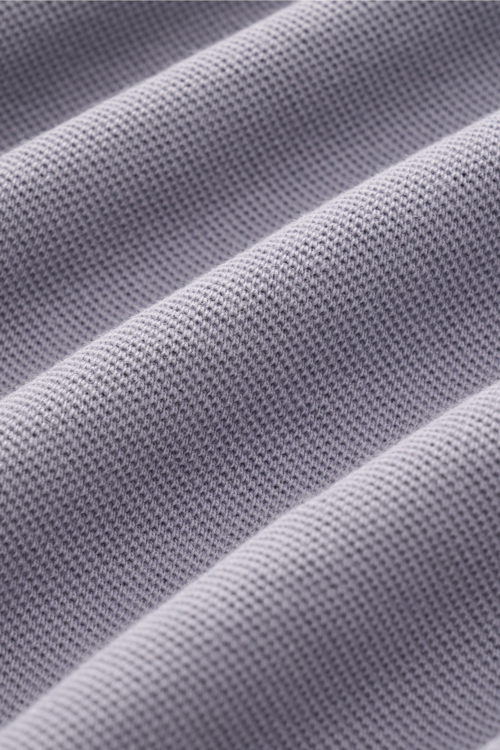 Close-up front view of lavender fabric texture of 04651/ A trip in a bag Piqué T-shirt lavender showing pure piqué cotton weave.

Summer essential: This piqué T-shirt from 04651/ A TRIP IN A BAG is a versatile staple that's perfect for warm days.
