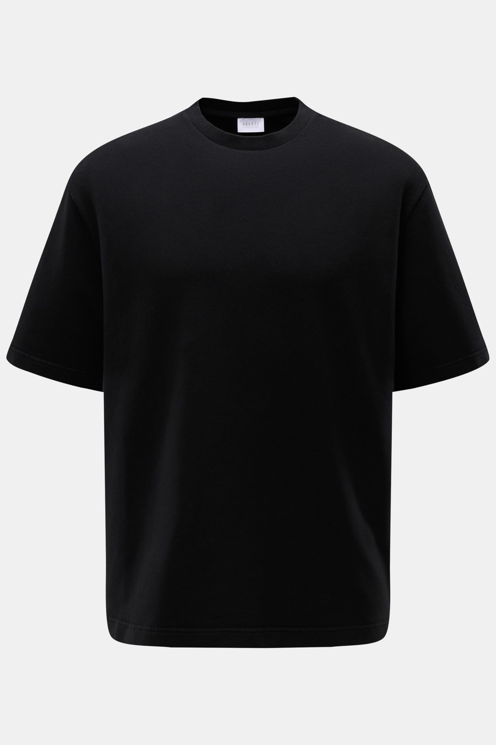 Front view of the 04651/ A trip in a bag Crew neck T-shirt 'If Tee' black, an oversized, heavy cotton jersey with soft feel.

Description: The uncomplicated cotton T-shirt 'IF Tee' by 04651/ A TRIP IN A BAG is a core basic for the new season that give 