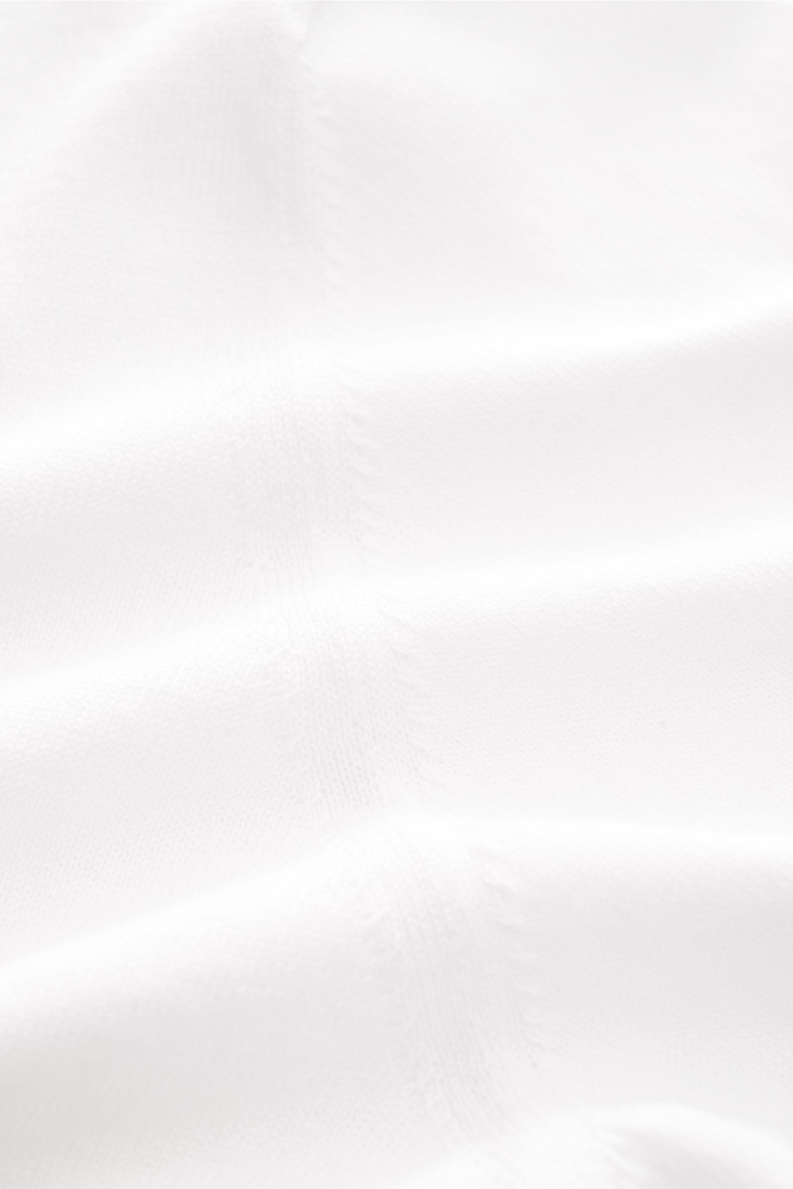 Close-up front view of the Filippo de Laurentiis Short sleeve jumper white, showcasing pure cotton fine knit fabric with a soft feel and standing collar. A versatile basic: This short sleeve jumper by FILIPPO DE LAURENTIIS features a timeless design and i