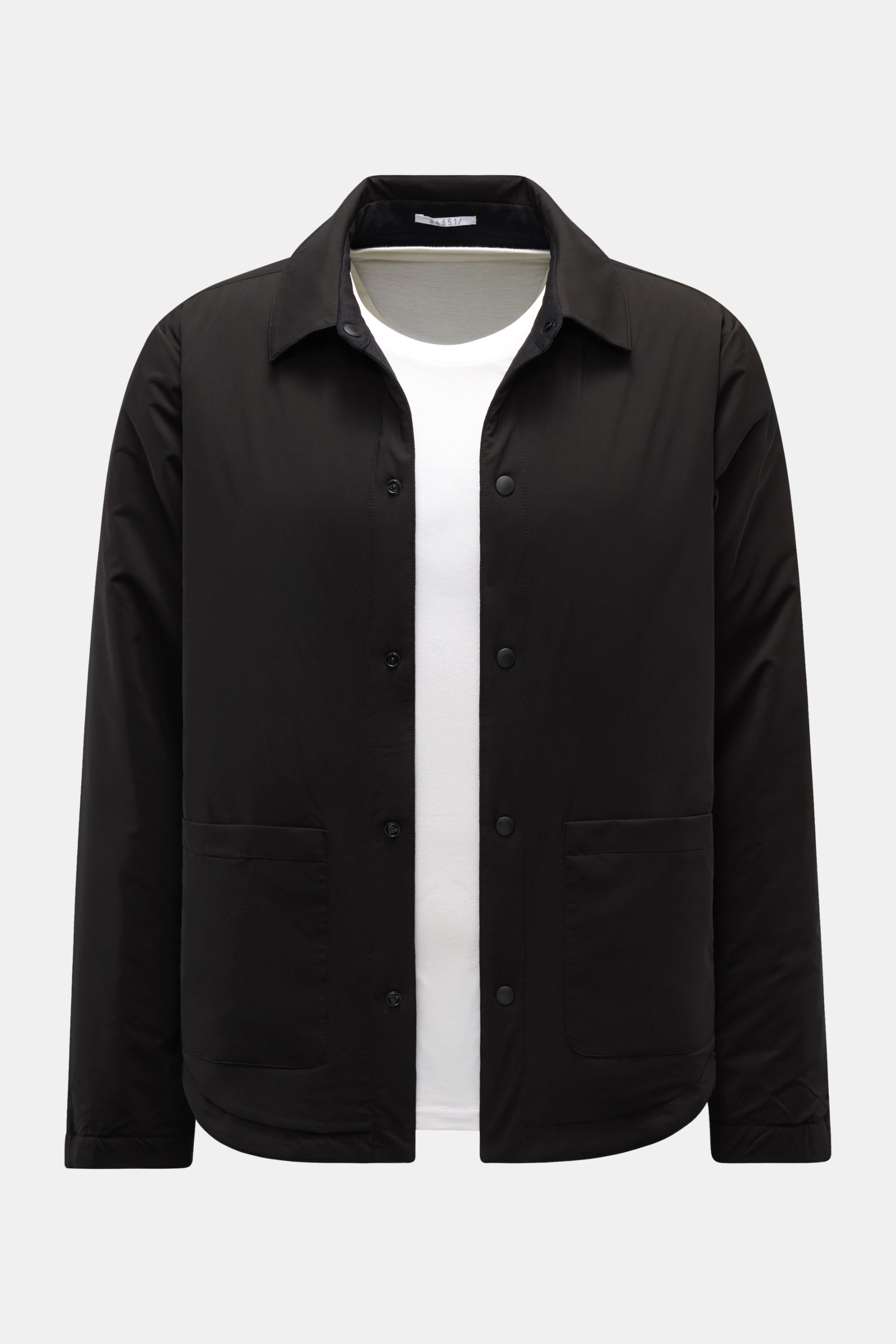 Front view of 04651/ A trip in a bag Reversible overshirt black, slim fit with snap button placket, turn-down collar, patch breast pockets with flap, side seam pockets, tonal lining, subtle woven label, rounded hem, lightweight padding, slight stretch, so