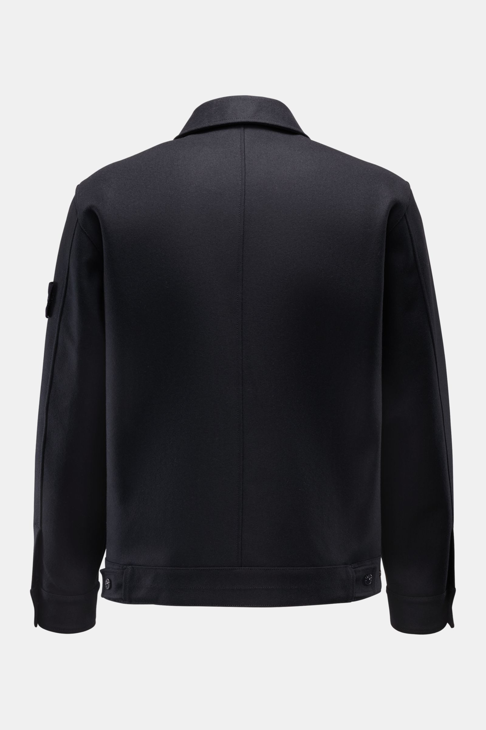 Back view of Stone Island Overshirt 'Ghost Piece' dark navy in felted wool blend with slim fit, turn-down collar, and monochrome logo badge.

Description: This overshirt by STONE ISLAND in a felted wool blend with a firm feel has an attractive monochro