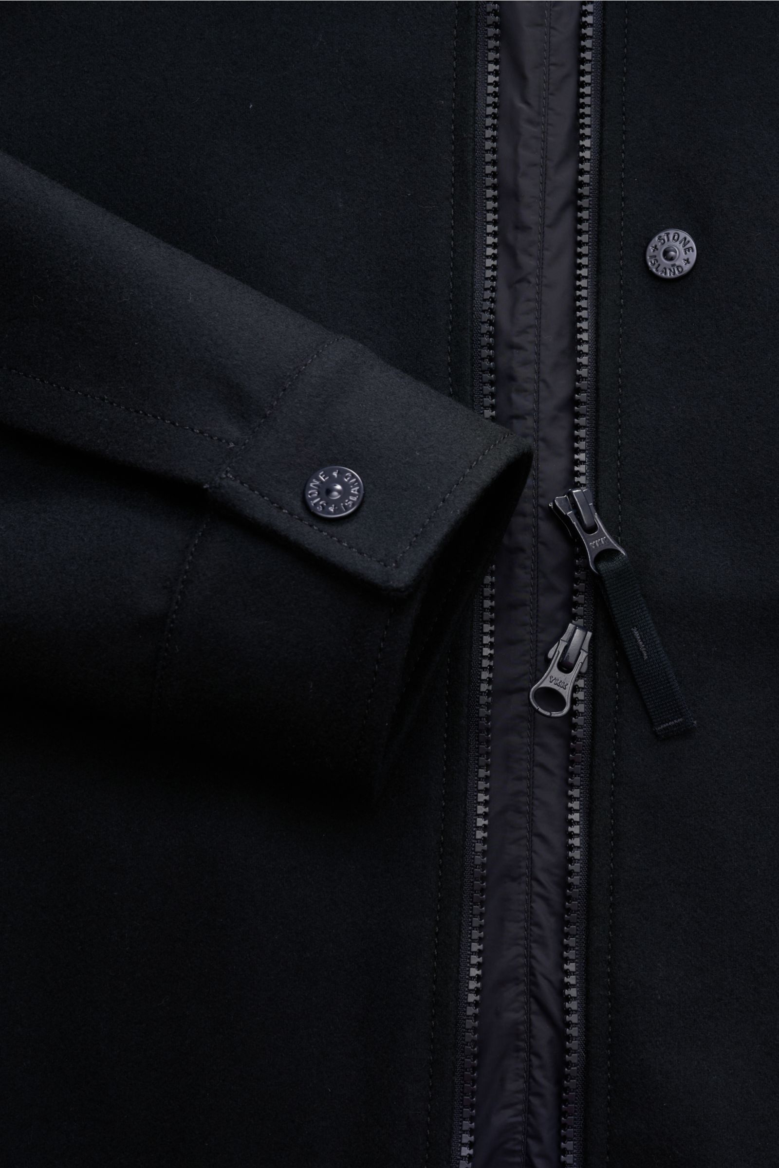 Stone Island Overshirt 'Ghost Piece' dark navy shown close-up from the front, highlighting the felted wool blend fabric, robust two-way zip, and logo button on cuff. 

This overshirt by STONE ISLAND in a felted wool blend with a firm feel has an attrac