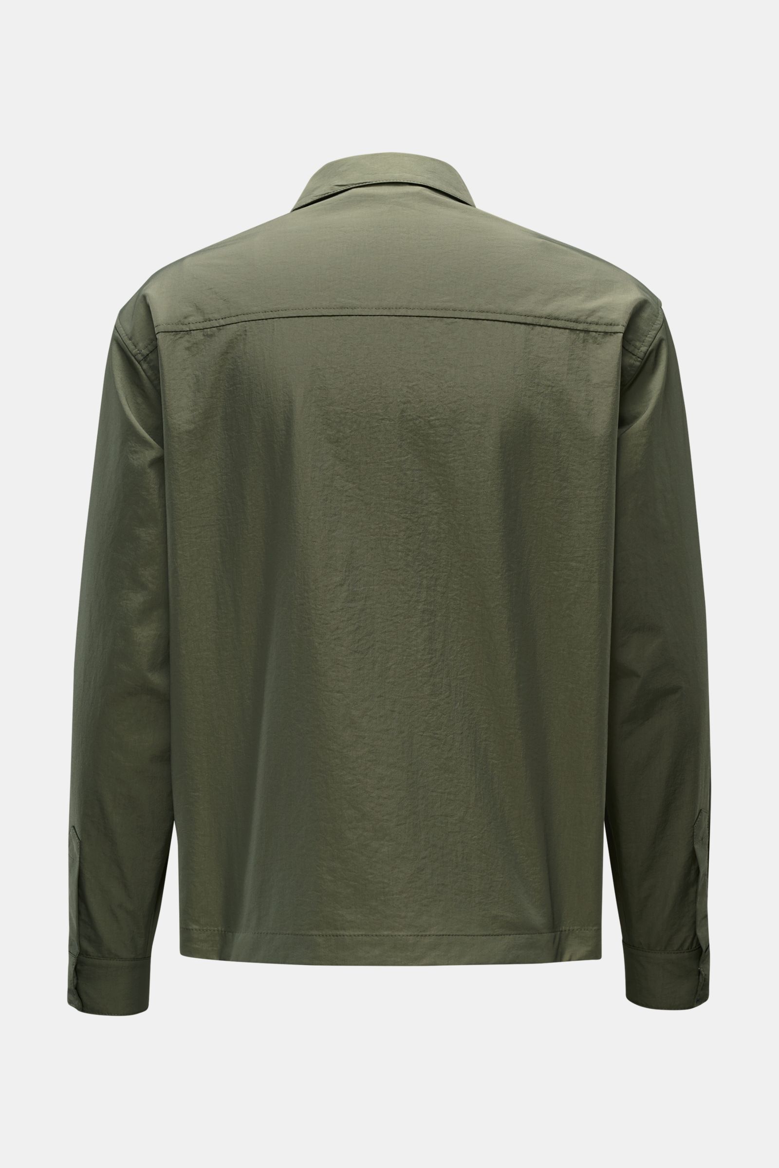Rear view of the 04651/ A trip in a bag Overshirt 'Travel Jacket' olive, made of lightweight, fast-drying microfiber.

This season, enhance your outerwear with a practical layer in the form of the super lightweight overshirt 'Travel Jacket' by 04651/ A