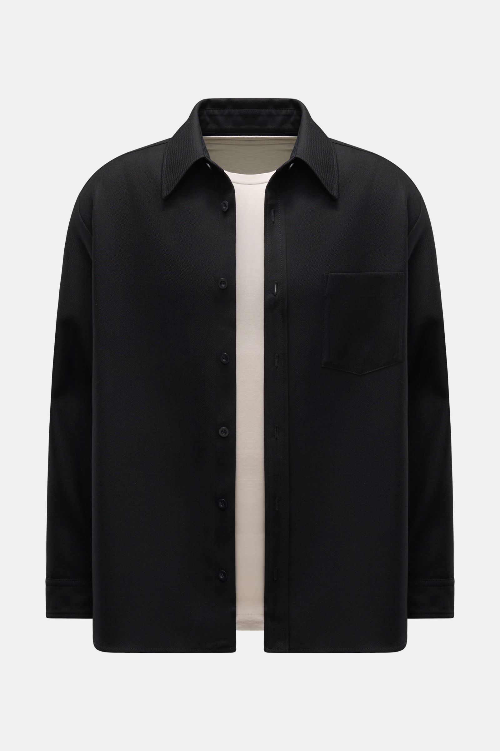Front view of A.P.C. Overshirt schwarz in black, featuring a seven-button placket, wool-microfiber mix, regular fit, chest pocket, cuffed sleeves, and a spread collar. Minimalist essential, clean design for versatile layering.