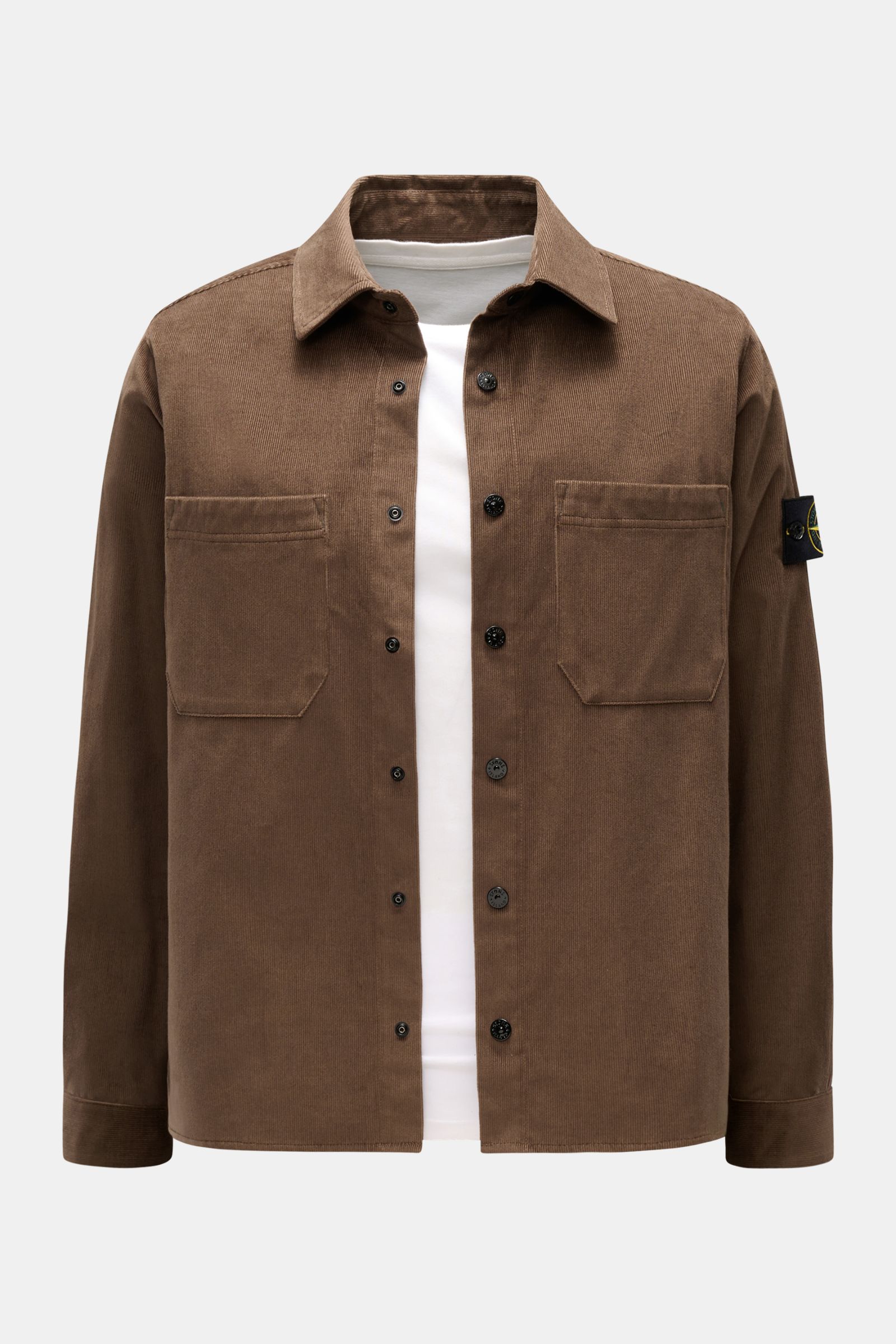 Front view of Stone Island Corduroy overshirt brown, featuring snap button placket, turn-down collar, patch breast pockets, and signature compass badge on sleeve.

Description: 
Sporty and practical – this straight cut overshirt by STONE ISLAND is char