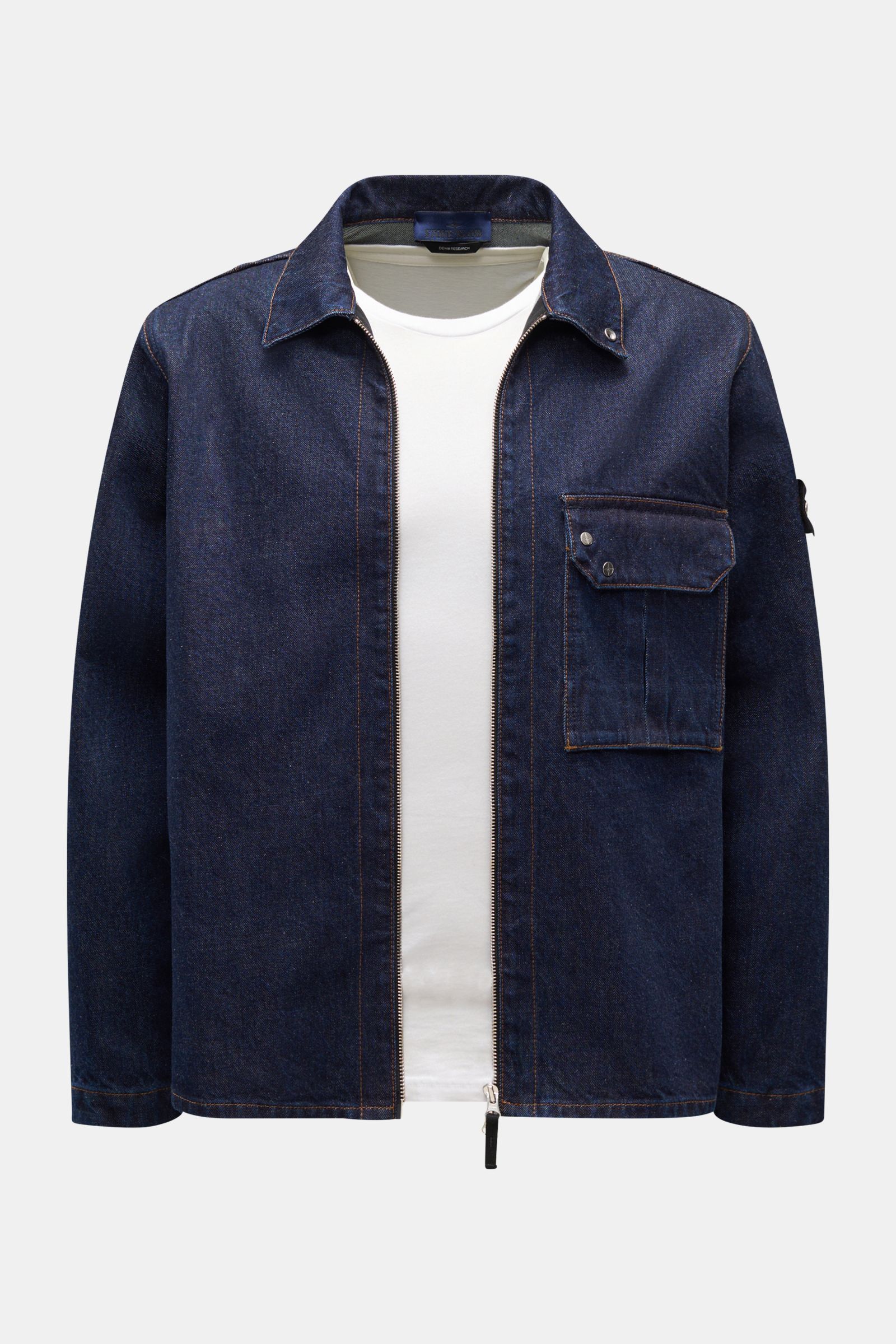 Front view of Stone Island Denim overshirt navy in indigo-dyed cotton with patch pocket, two-way zip, turn-down collar, snap button cuffs, and compass badge. For casual denim looks: Made from indigo-dyed cotton yarn, this overshirt from the STONE ISLAND '