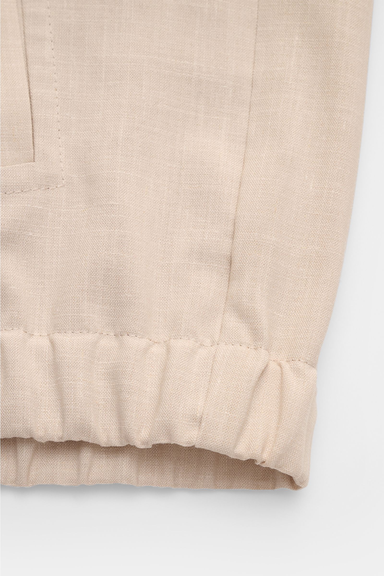 Close-up front view of the elasticated hem on the Incotex Overshirt beige mottled, made of virgin wool-silk blend with precise stitching.