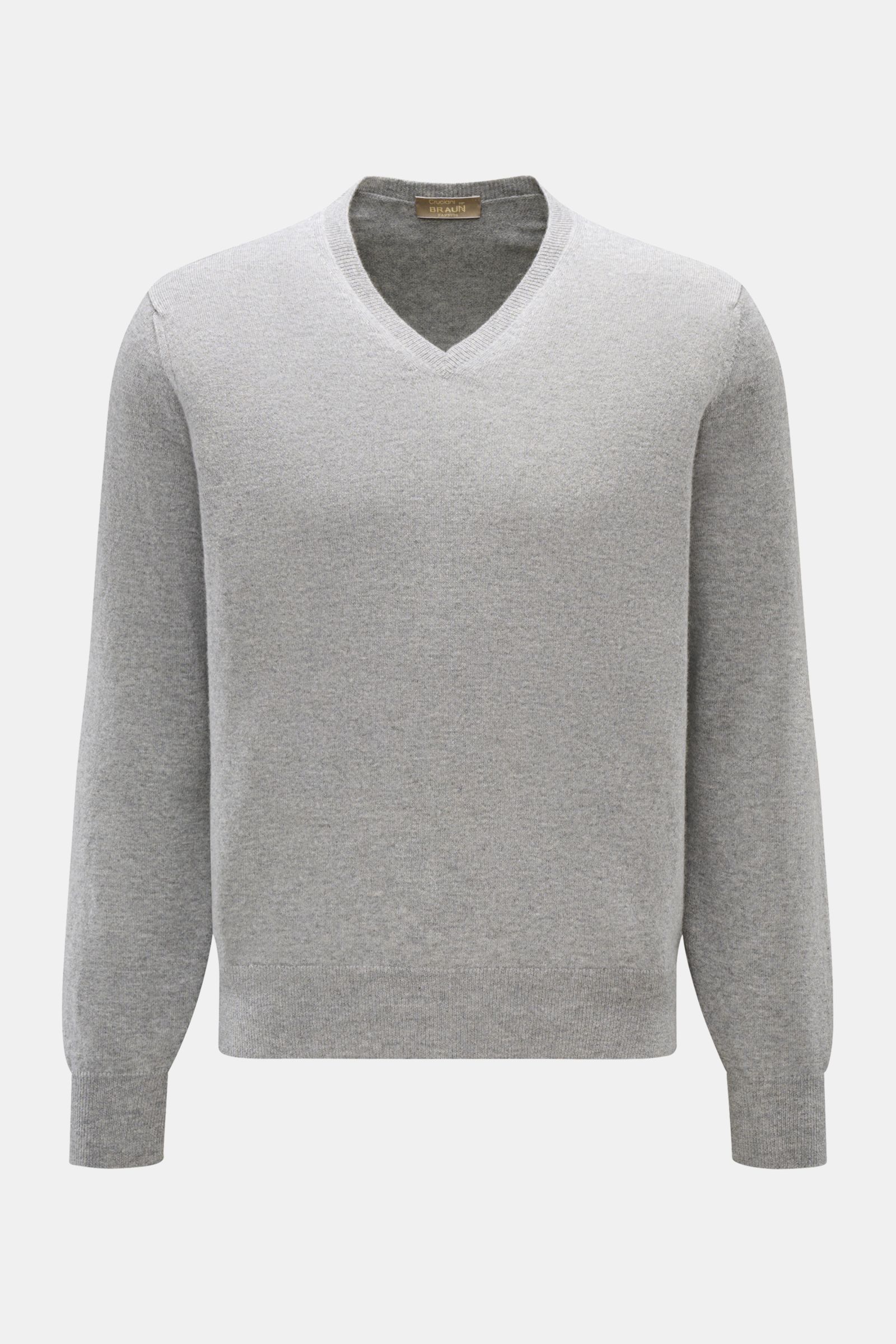 Front view of Cruciani Cashmere V-neck jumper grey mottled with long sleeves, ribbed cuffs and hem, slim fit in fine knit cashmere.

This V-neck jumper in pure cashmere by CRUCIANI is the epitome of understatement and style. Its smooth feel and fine kn