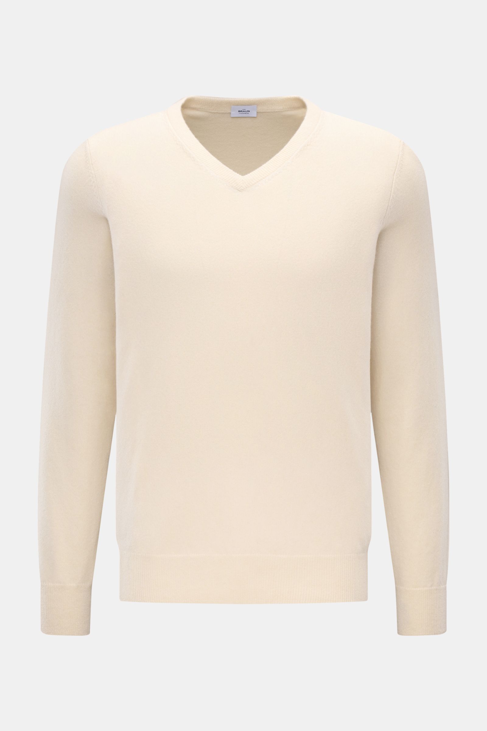 Front view of von Braun Cashmere V-Neck Pullover creme, a slim fit V-neck sweater with fine knit, elastic rib cuffs, made of pure Mongolian cashmere.

Geschmeidiges Basic für die kalte Jahreszeit: Der VON BRAUN V-Neck Pullover – gefertigt aus reinem 