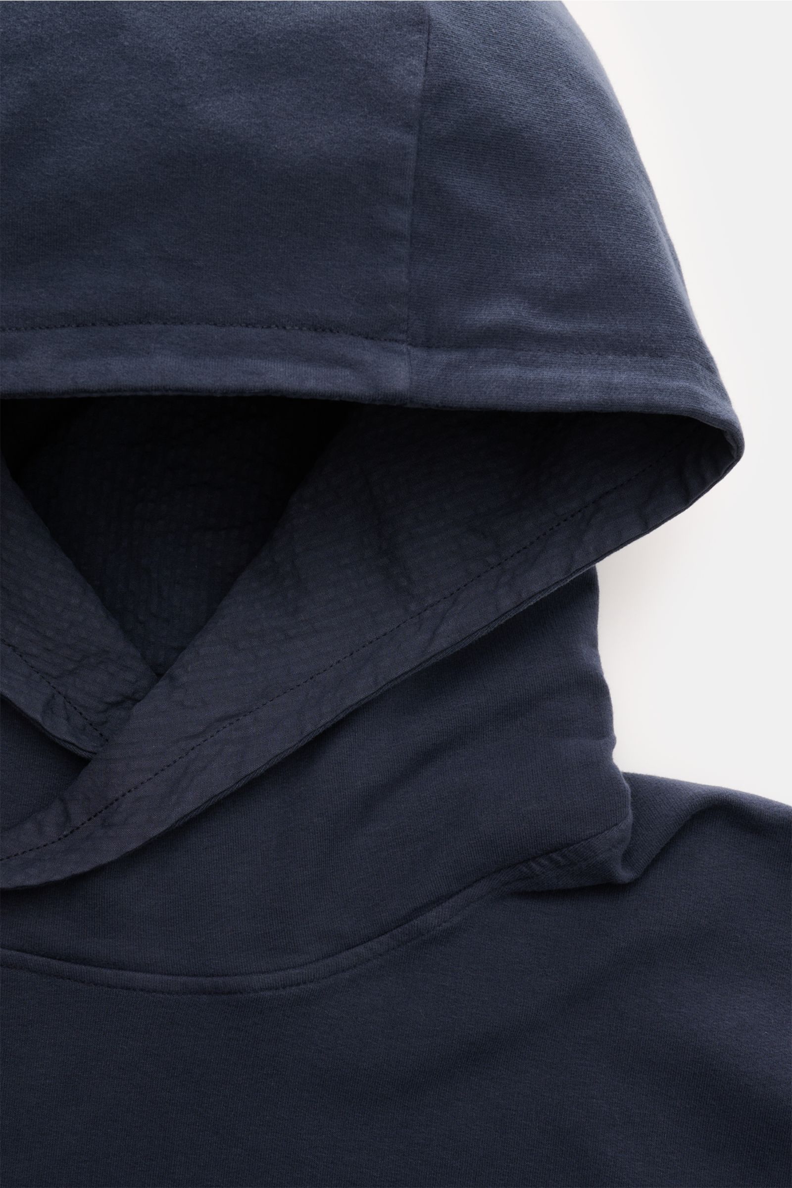 Close-up front-top view of the hood on the 04651/ A trip in a bag Hooded jumper 'IF Hoodie' dark blue, made from stretchy brushed cotton jersey with a soft feel, featuring a practical hood and comfortable ribbed bands.
