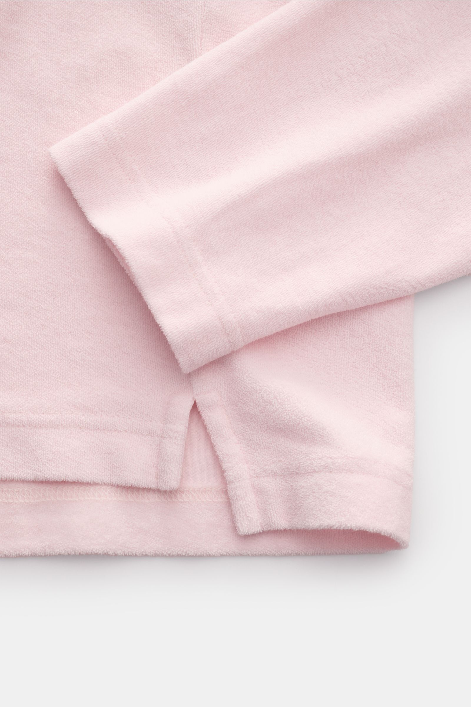 04651/ A trip in a bag Frottee-Kapuzenpullover 'Terry' rosé, Detailaufnahme Ärmel und Saum, reiner Baumwoll-Frottee, weicher Griff, Regular Fit, Kapuze, Weblabel.