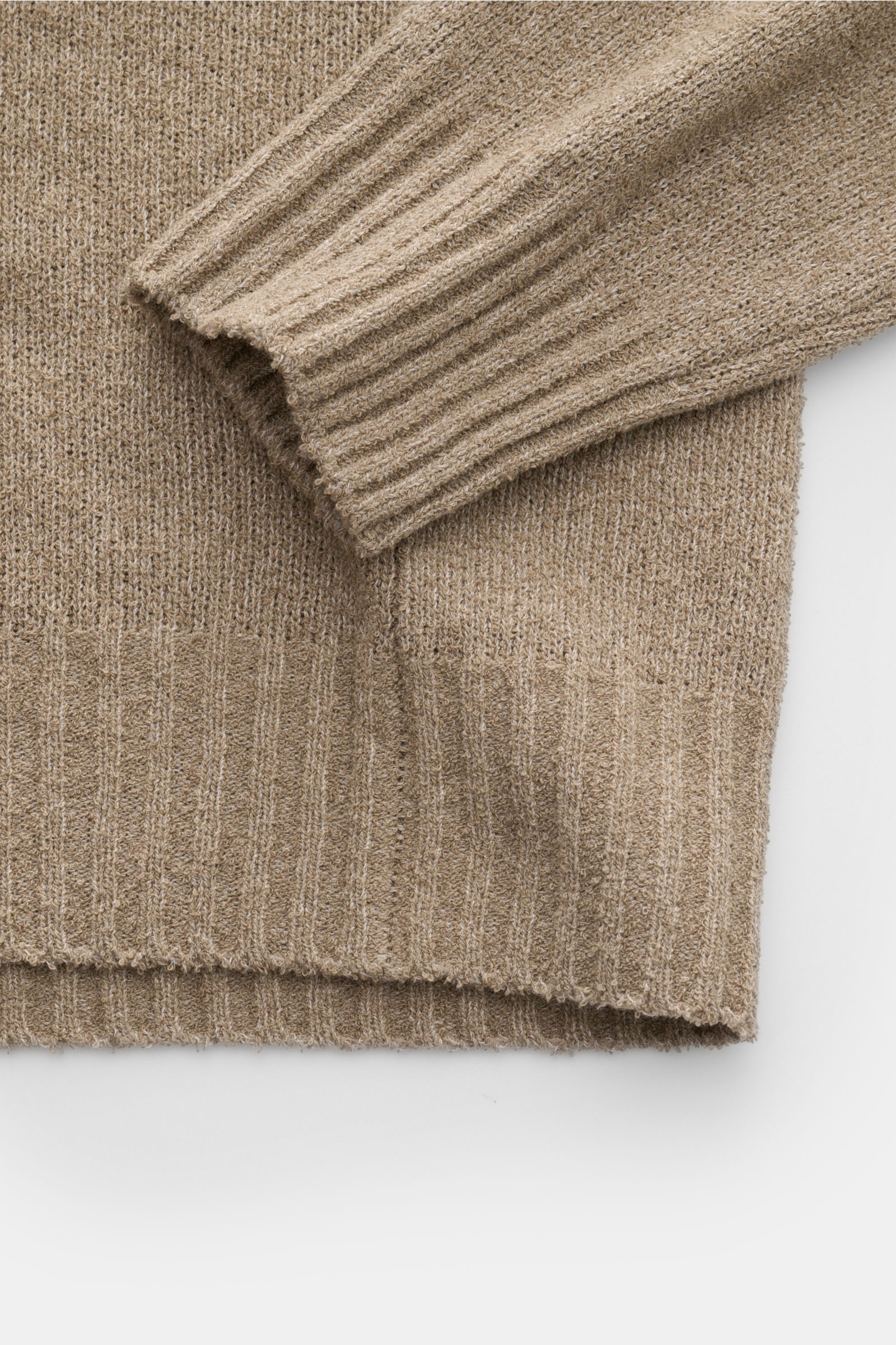 Close-up angled view of the sleeve cuff and hem of the 04651/ A trip in a bag Hooded jumper 'Knit Terry Hoodie' taupe mottled showing fine bouclé texture and ribbed bands. 

Distinctive terry look: The casual hooded jumper 'Knit Terry Hoodie' by 04651/