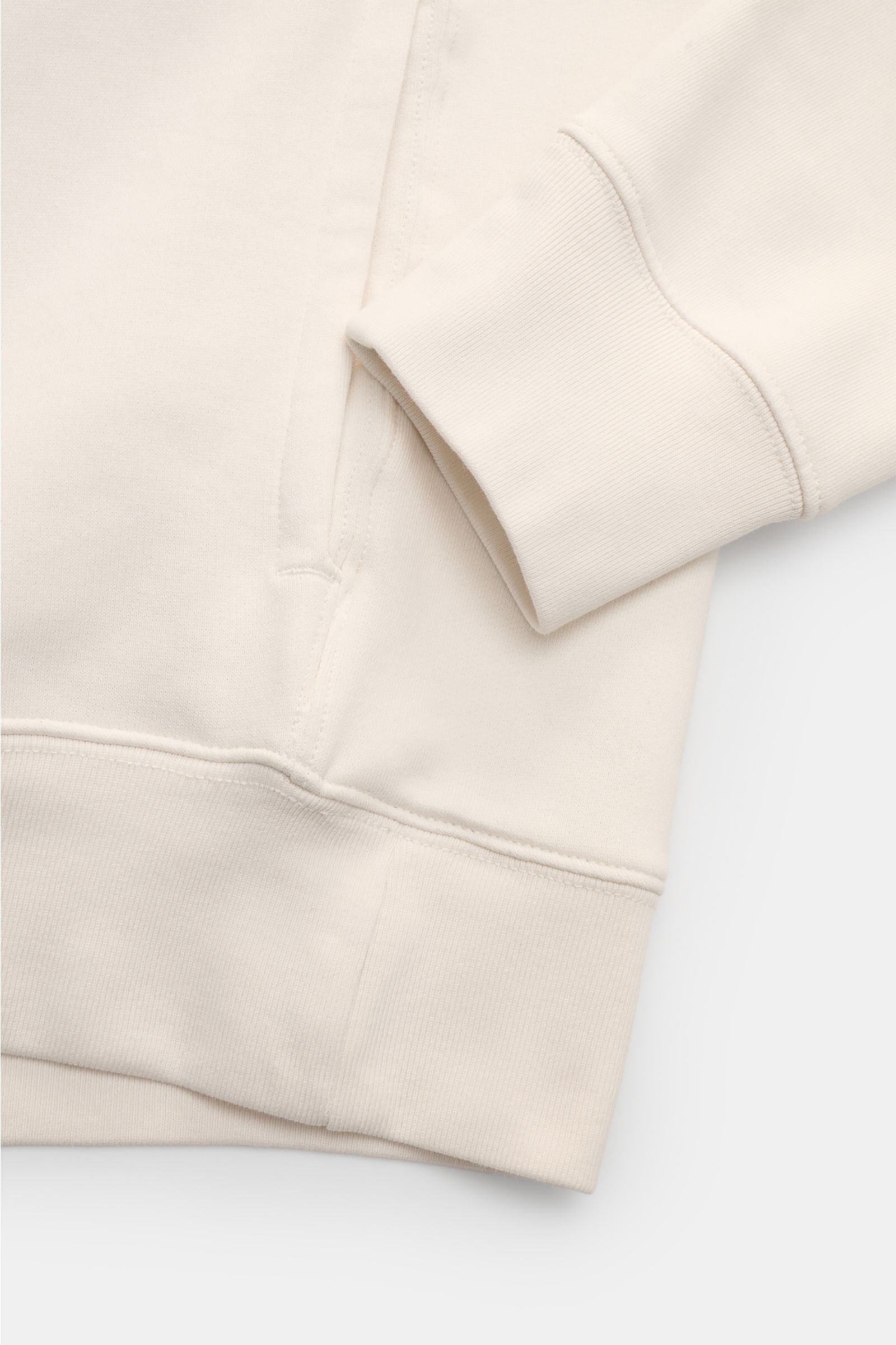 Close-up front view of Polo Ralph Lauren Hooded jumper white showing ribbed cuff, side pocket, and soft cotton microfiber fabric.

Iconic signature style by POLO RALPH LAUREN: This hooded jumper with a soft fleece lining combines casual comfort with on