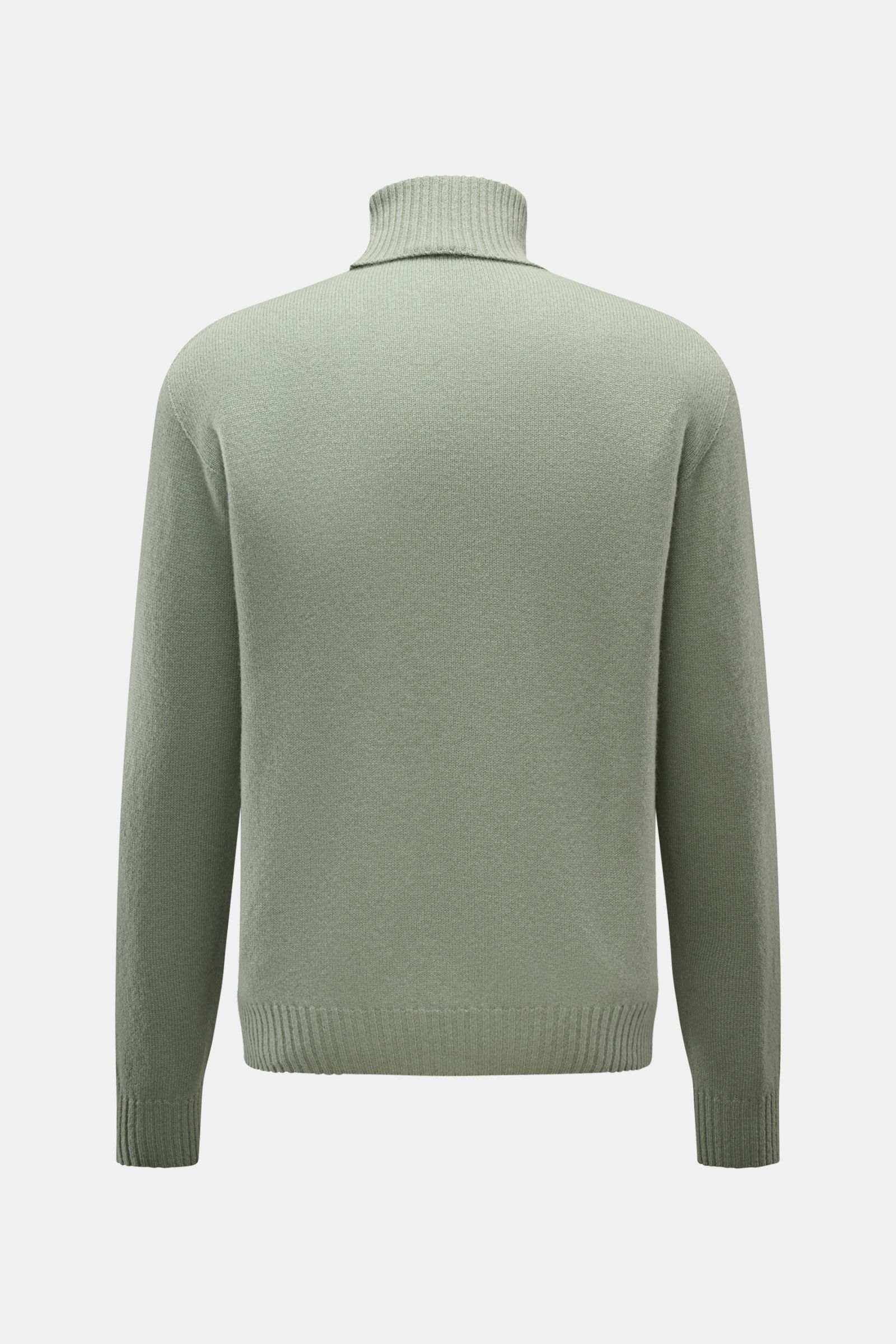 Back view of 04651/ A trip in a bag Cashmere turtleneck jumper sage in soft sage, made of pure cashmere with rib knit turtleneck and bands.

Description: A timeless classic for the colder months: With its comfortable material made of pure cashmere, the tu