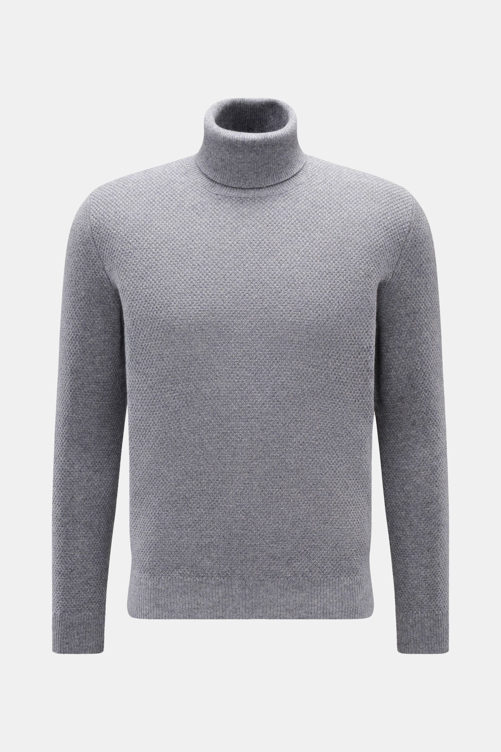 Front view of von Braun Cashmere turtleneck jumper grey mottled, slim fit with soft, fine textured knit and ribbed turtleneck and bands.

Get ready for the colder months with VON BRAUN: This turtleneck jumper in pure, Mongolian cashmere in a fine textu