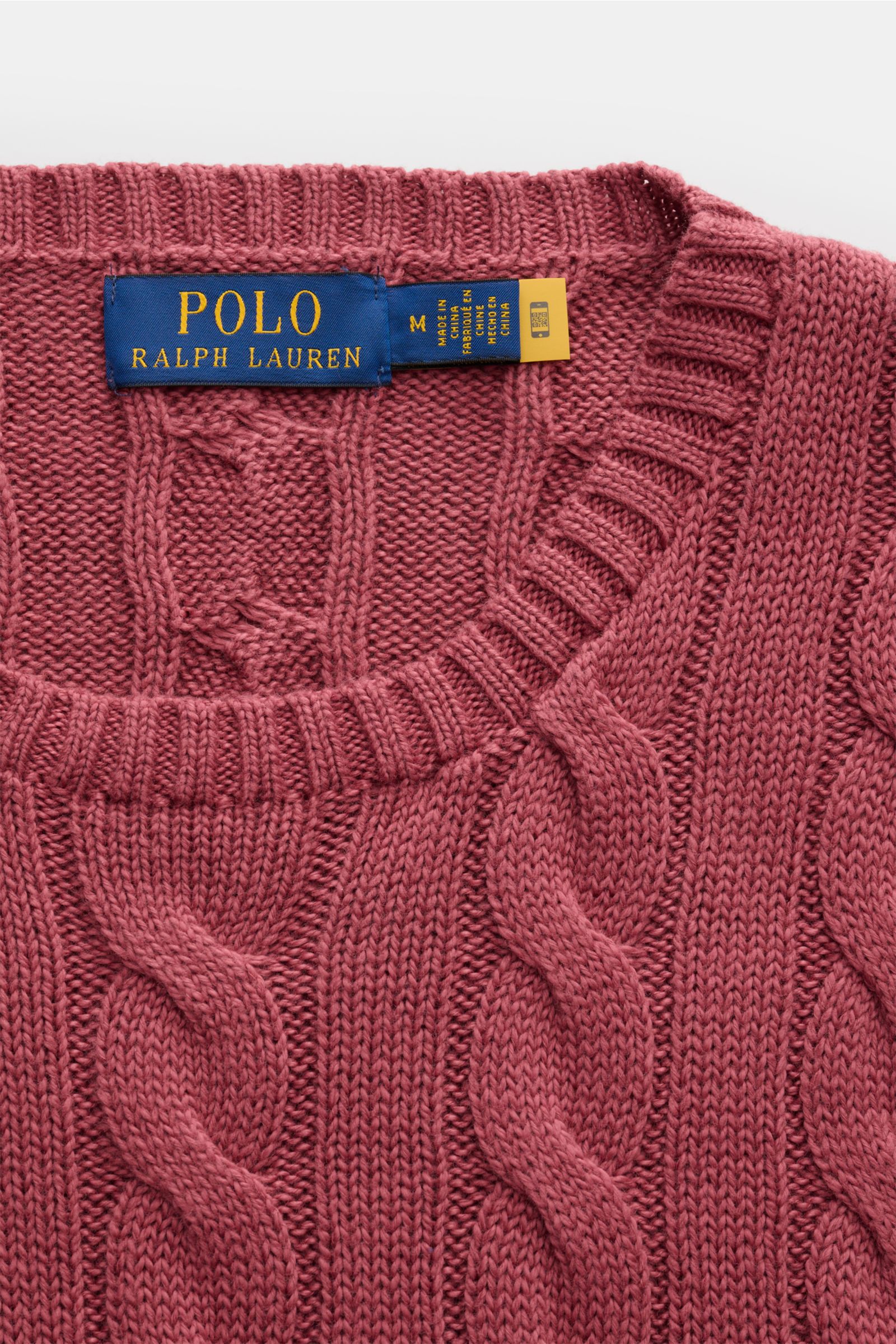 Polo Ralph Lauren Crew neck jumper bright red shown from a top-down close-up perspective, featuring pure cotton cable knit and ribbed bands. A classic from POLO RALPH LAUREN: This pure cotton jumper is decorated with textured cable knit and the classic si