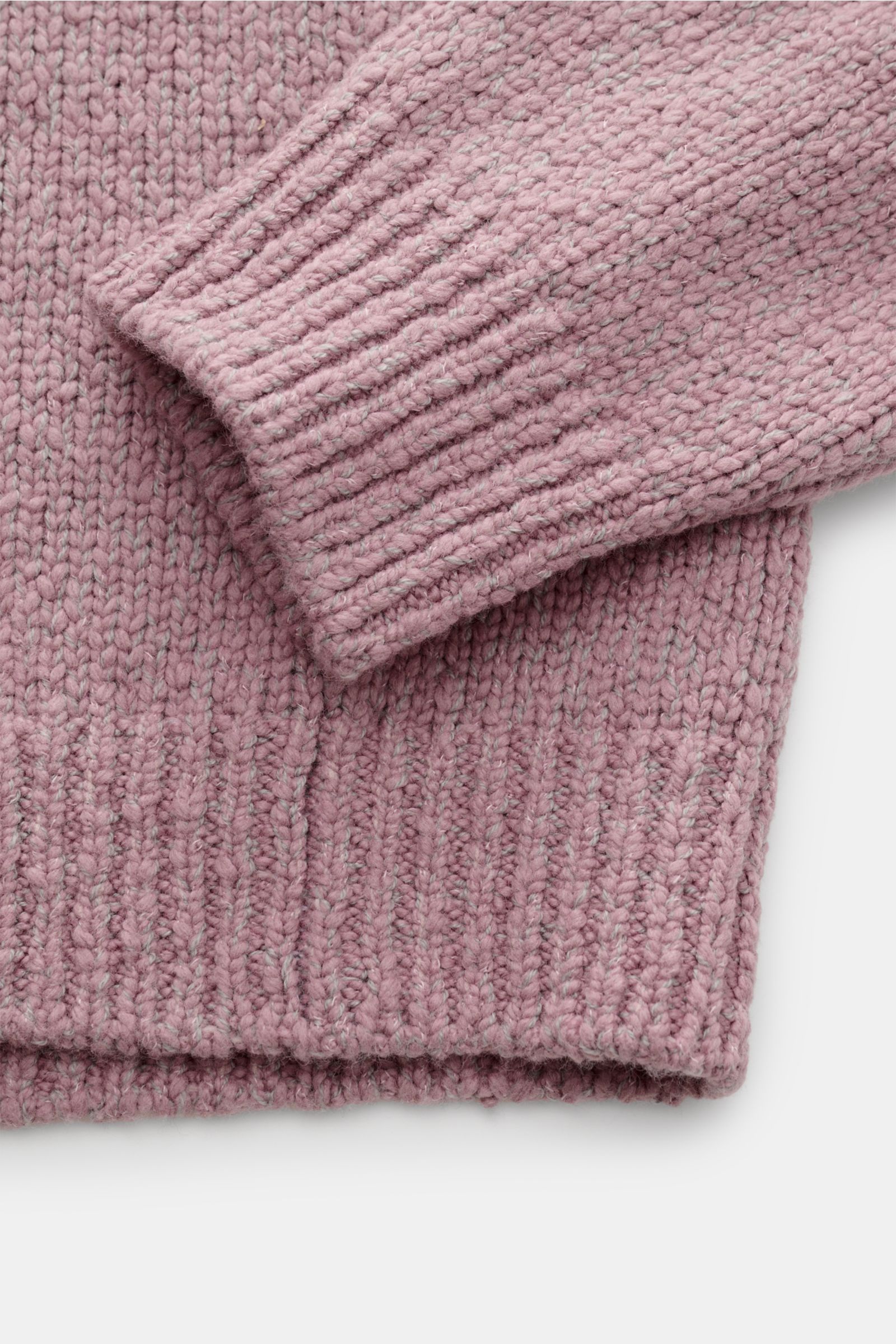 Close-up top-down view of the sleeve and hem of the Stone Island Crew neck jumper 'Fancy Yarn' antique pink mottled, showing medium-fine knit in wool blend.

Description:  
A stylish essential for the coming season: The casual jumper 'Fancy Yarn' in a 