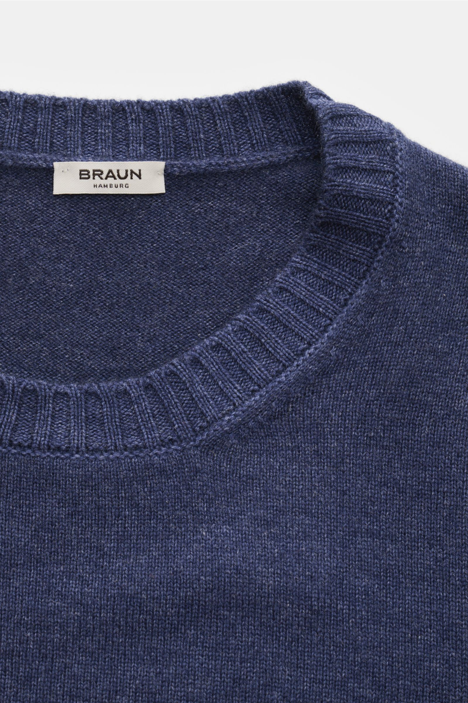 Close-up front view of the BRAUN Hamburg Crew neck jumper dark blue melange, showcasing fine knit crew neck with ribbed bands, made of virgin wool, viscose, and cashmere blend, offering a soft feel, regular fit, and timeless winter comfort.