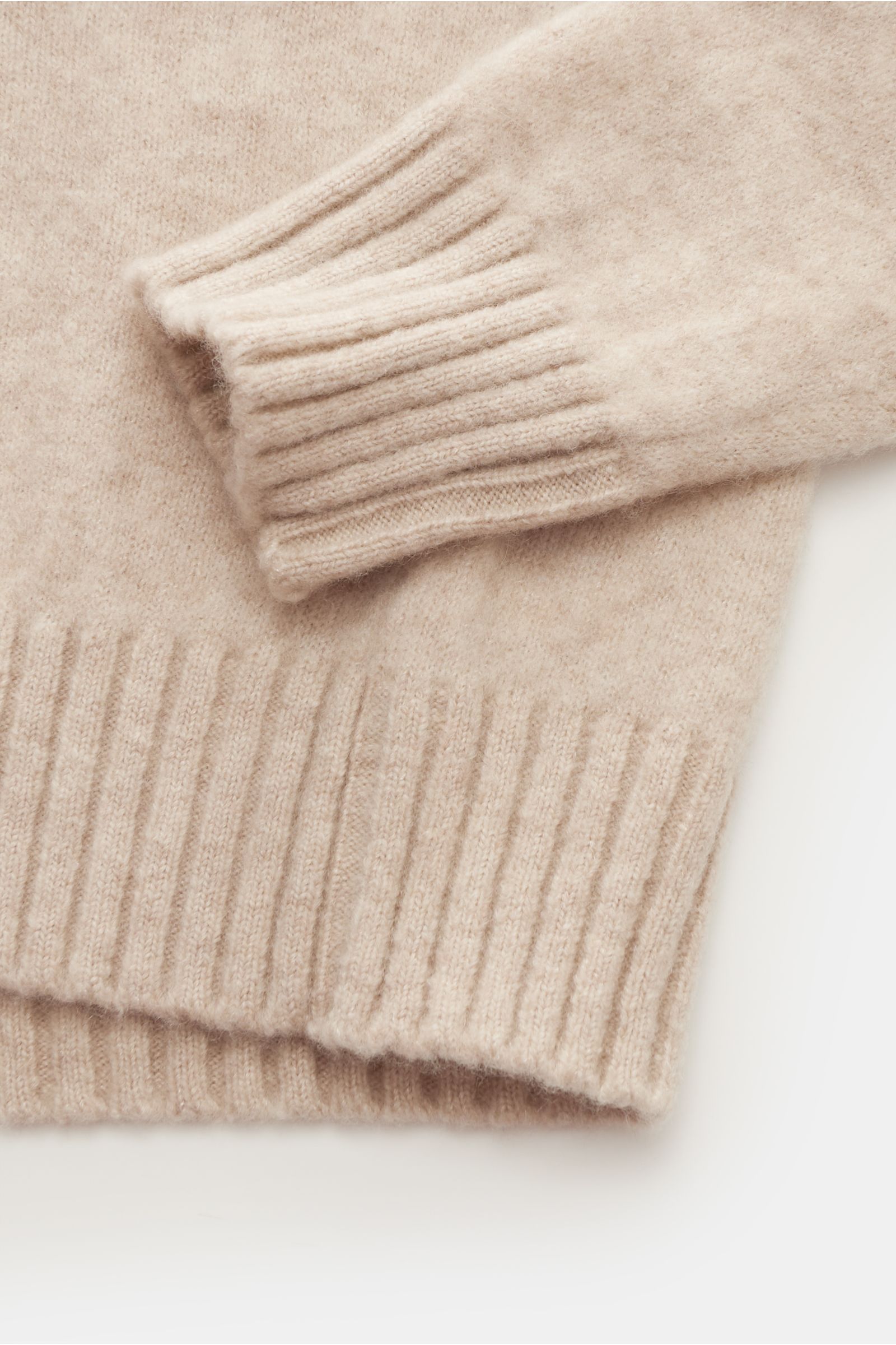 Close-up top-down view of the Piacenza 1733 Crew neck jumper sand showing ribbed cuffs and hem in soft fine knit fabric.

What is probably this season’s softest crew neck jumper comes from Italian spinning mill PIACENZA – this timeless model in cashmer