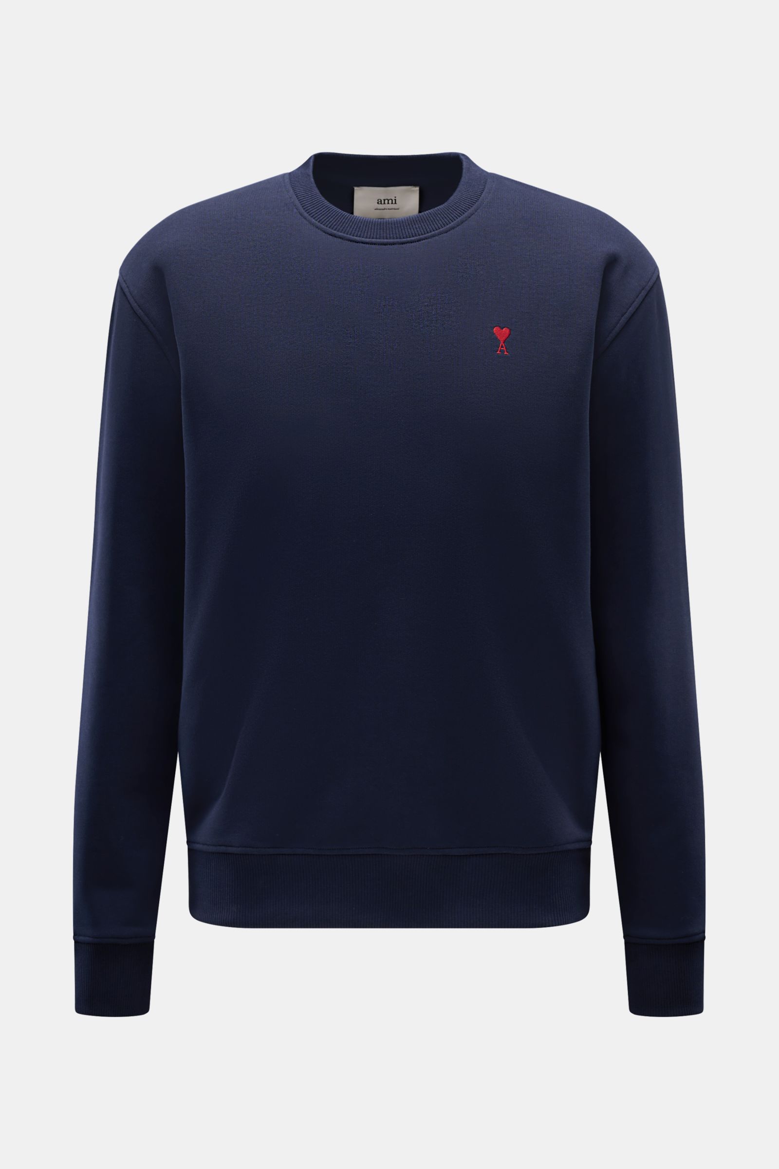 Front view of Ami Paris Rundhals-Sweatshirt dunkelblau, a dark blue oversized unisex sweatshirt in stretch organic cotton with round neckline, red heart-stitch on chest, rear AMI stitching, and ribbed cuffs. Love is in the air! Das markentypische Herz-