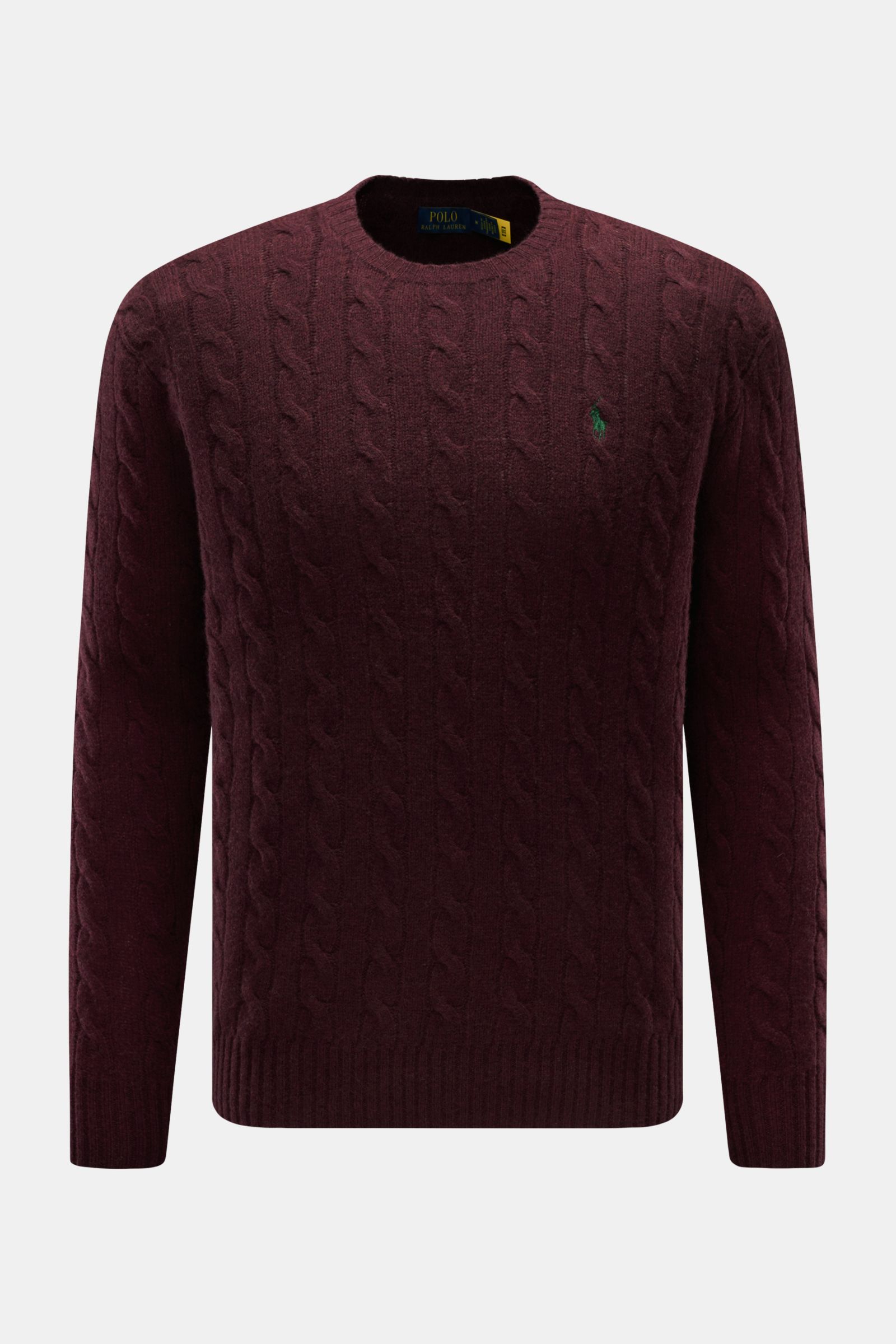 Front view of a Polo Ralph Lauren Rundhalspullover bordeaux in slim fit, made of wool and cashmere with a soft feel, featuring a classic cable knit pattern, round neckline, ribbed cuffs, and the signature polo player stitching on the chest. This classic s