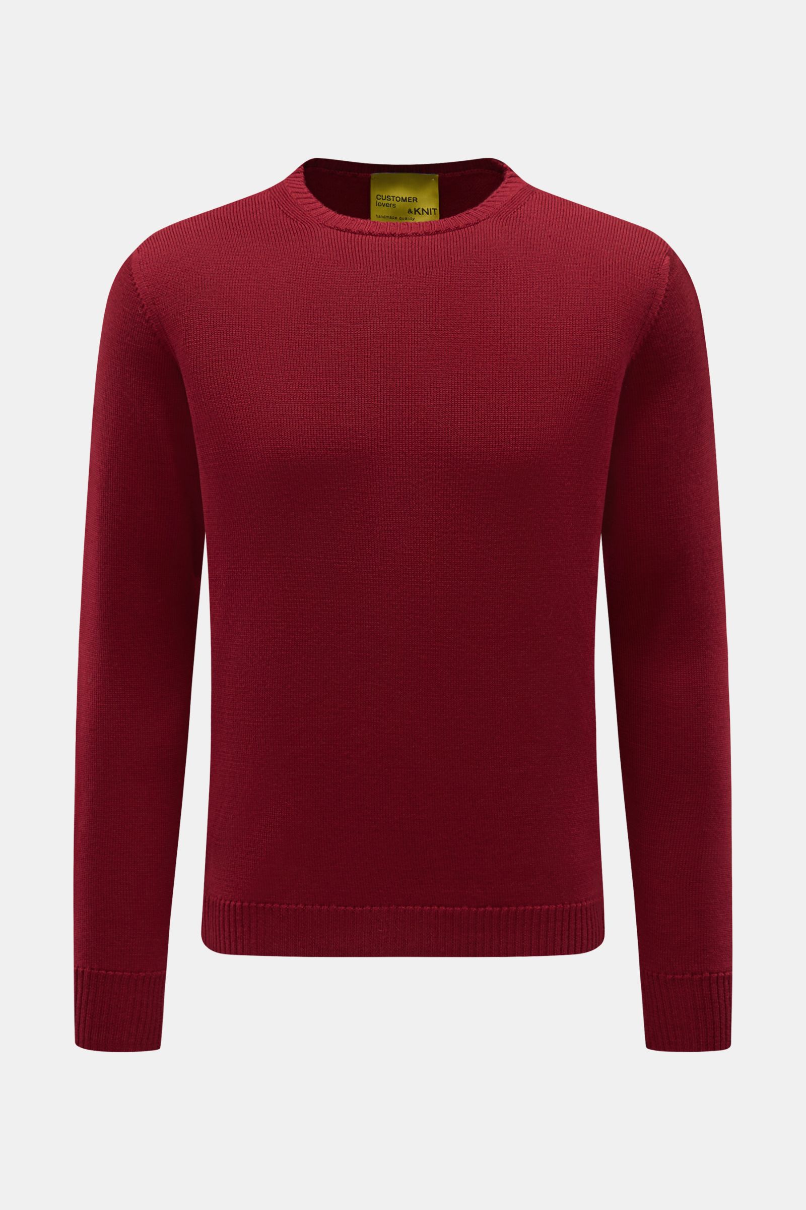 B.F. Knitwear Merino Rundhalspullover dunkelrot, frontal fotografiert, aus reiner Merinowolle, weicher Griff, mittelgrobes Strickbild, Slim Fit, Rundhalsausschnitt, flexible Rippstrick-Bündchen.