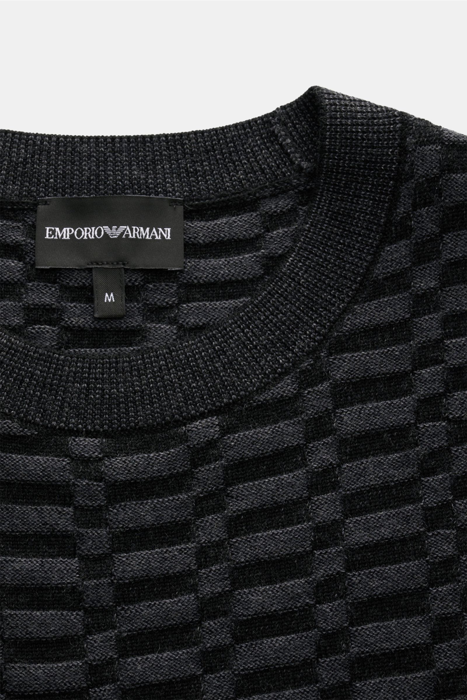 Emporio Armani Rundhalspullover schwarz/dunkelgrau gemustert, Close-up von oben, feines Strickbild, Rundhalsausschnitt, weiche Schurwolle, Regular Fit, Rippbündchen, Weblabel am Saum.