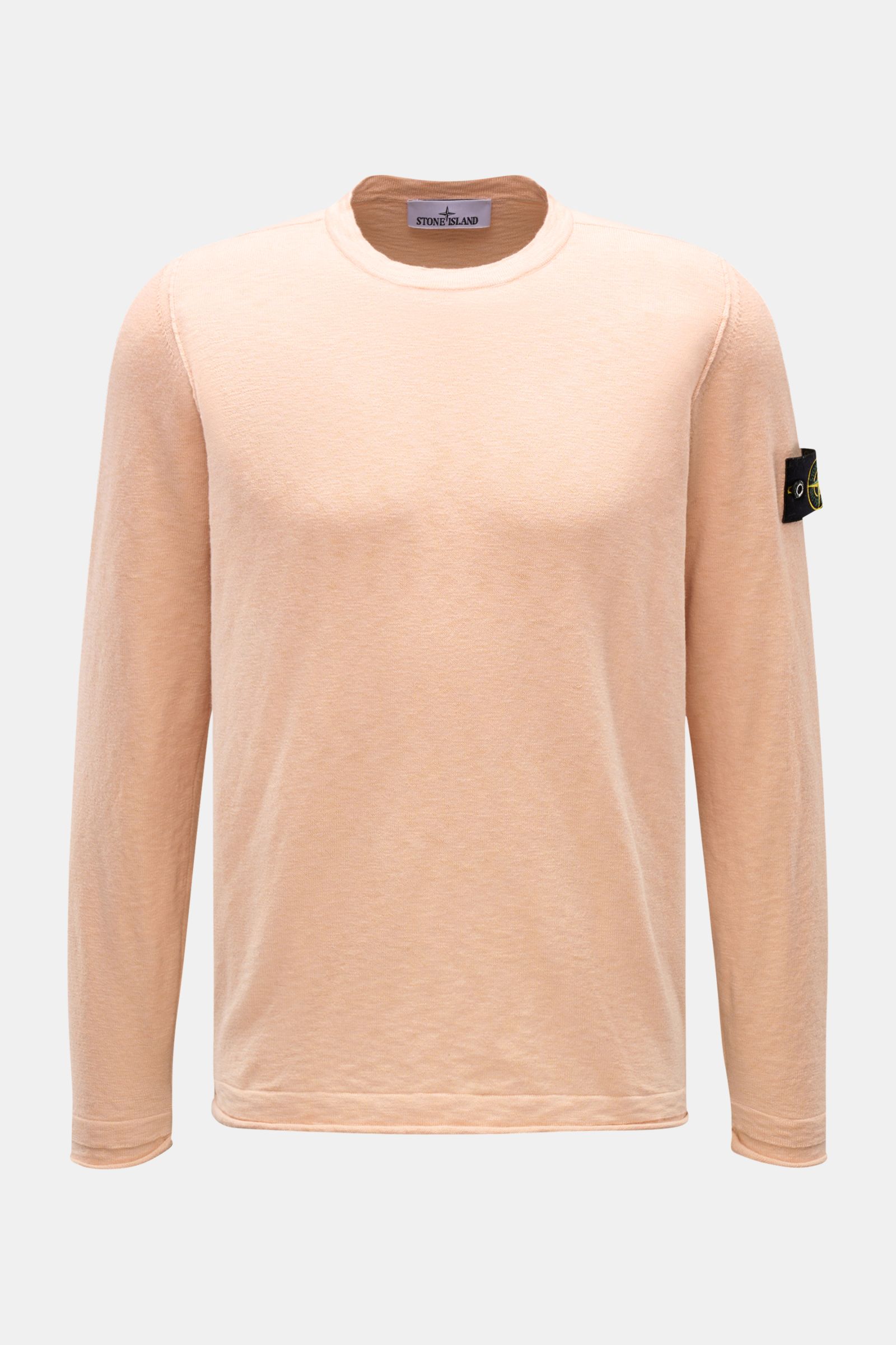 Stone Island Crew neck jumper apricot shown from the front, slim fit in a fine knit blend of cotton and microfiber with a soft feel, crew neck, rolled hem, strategically positioned seams, and signature compass badge on the left sleeve.