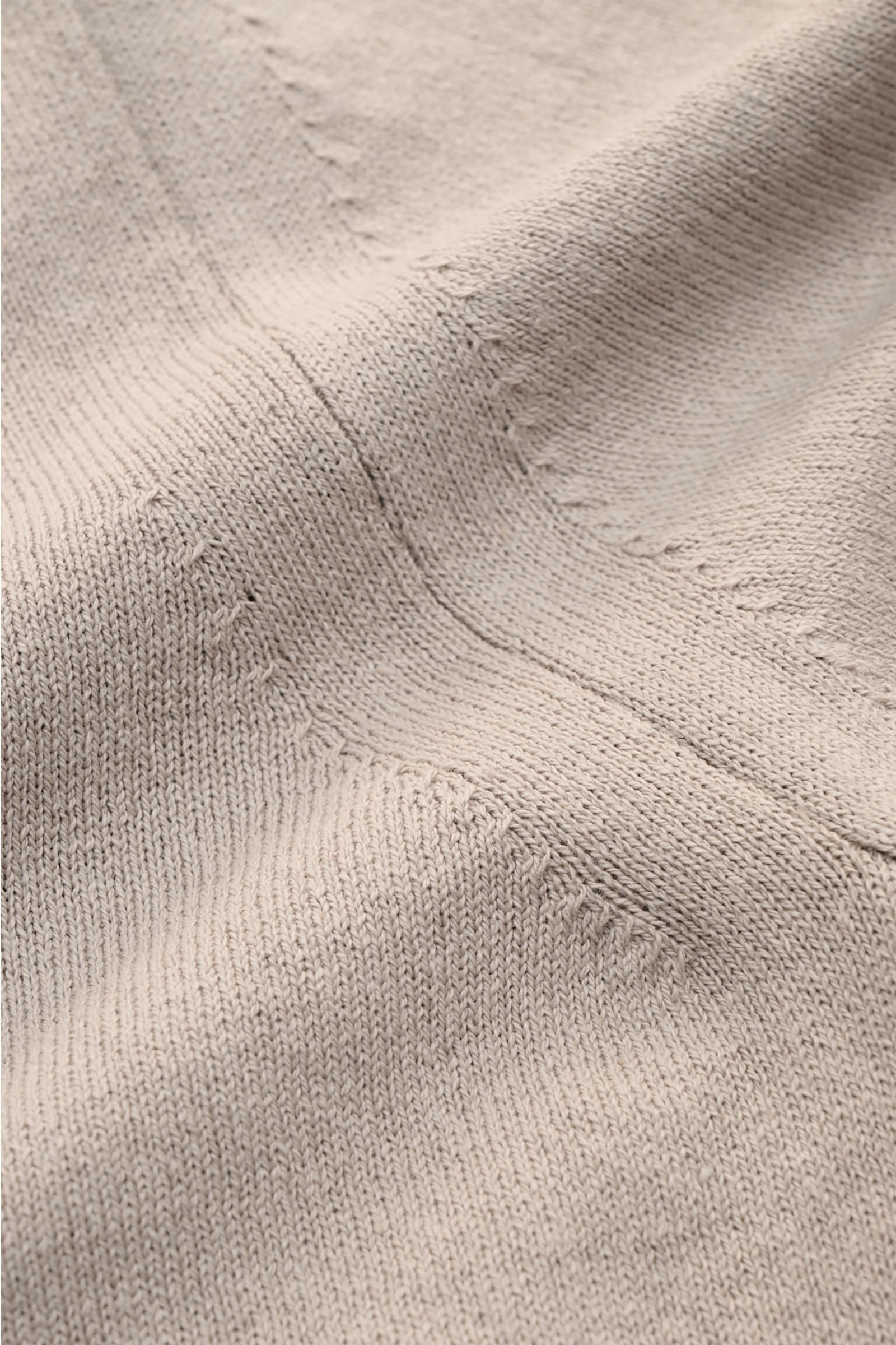 Close-up front view of Stone Island Crew neck jumper light grey showing fine knit, rolled edges, and cotton texture.

Description: STONE ISLAND has transformed this crew neck jumper into a sophisticated basic with fine details like the rolled hem and w
