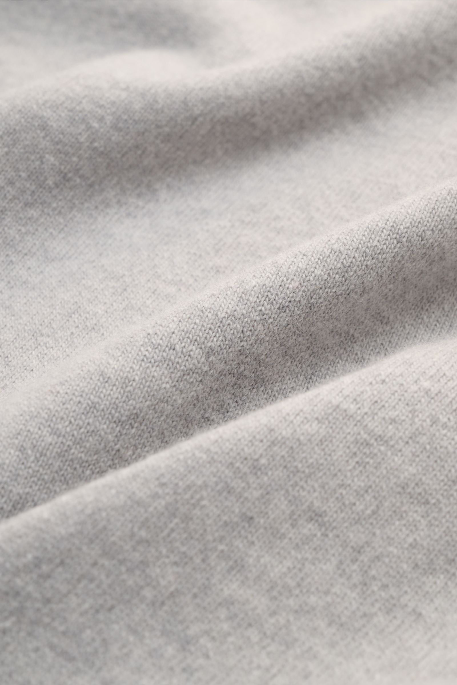 Close-up texture of the Stone Island Crew neck jumper grey, showing fine pure wool knit with soft feel and elasticated ribbed bands.

Description: A timeless piece from STONE ISLAND: If you want to create a warm, sporty look, you can’t go wrong with th