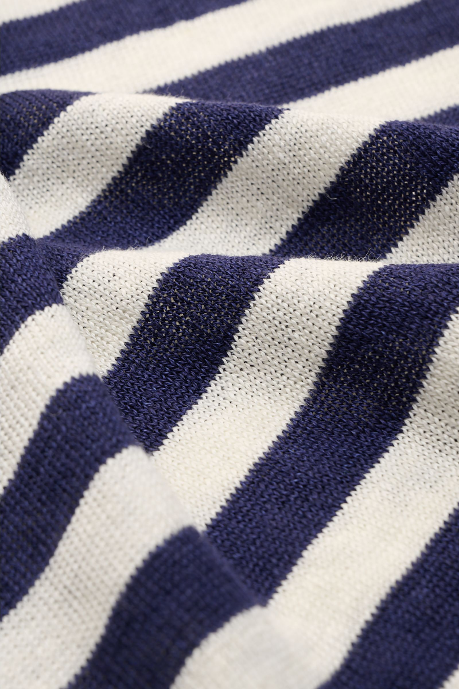 Close-up front view of Doppiaa Crew neck jumper 'Aalfeo' navy/cream striped showing fine knit, classic stripes, and soft linen texture.