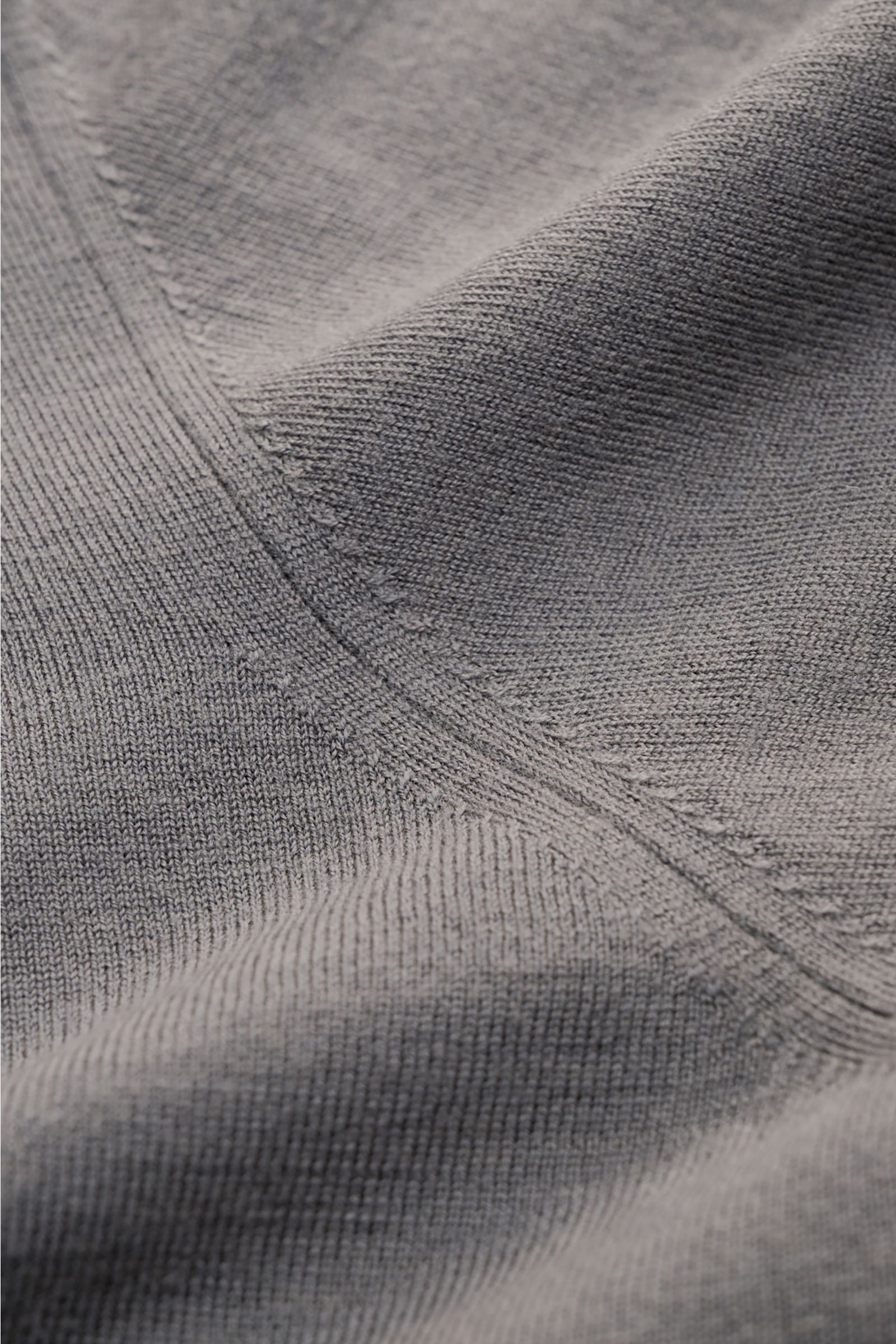 Close-up front view of the Colombo Crew neck jumper dark grey showing fine knit texture and stitching details.

Description: Subtle luxury: Made from exclusive 'Kid Wool', this elegant fine knit crew neck jumper impresses with its delightfully fine fee