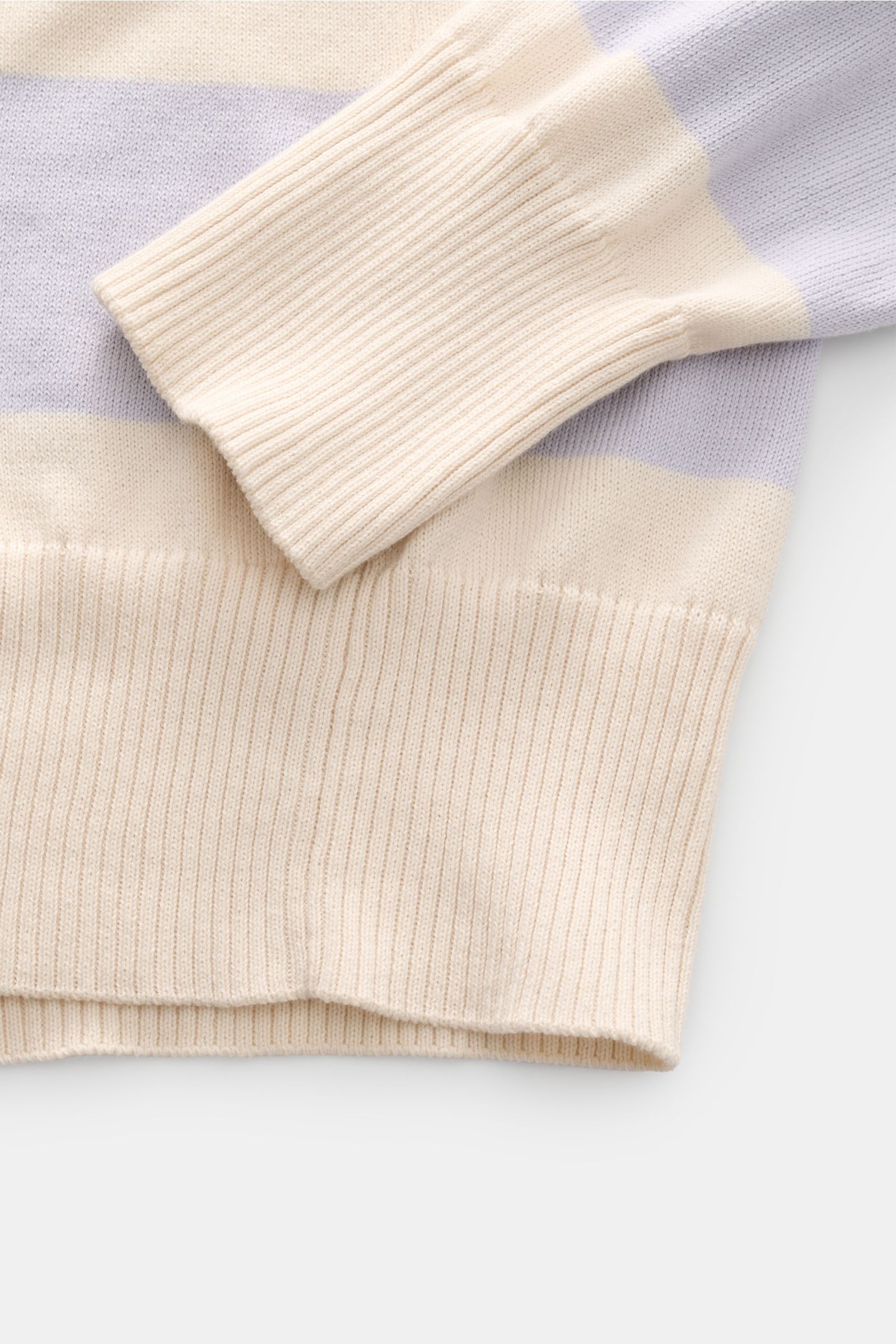 Close-up front view of B.F. Knitwear Crew neck jumper lavender/cream striped showing fine knit cotton fabric, elasticated rib knit bands, and quilted decorative stitching.

Lightweight summer knit by experts B.F. KNITWEAR: This fine knit crew neck jump