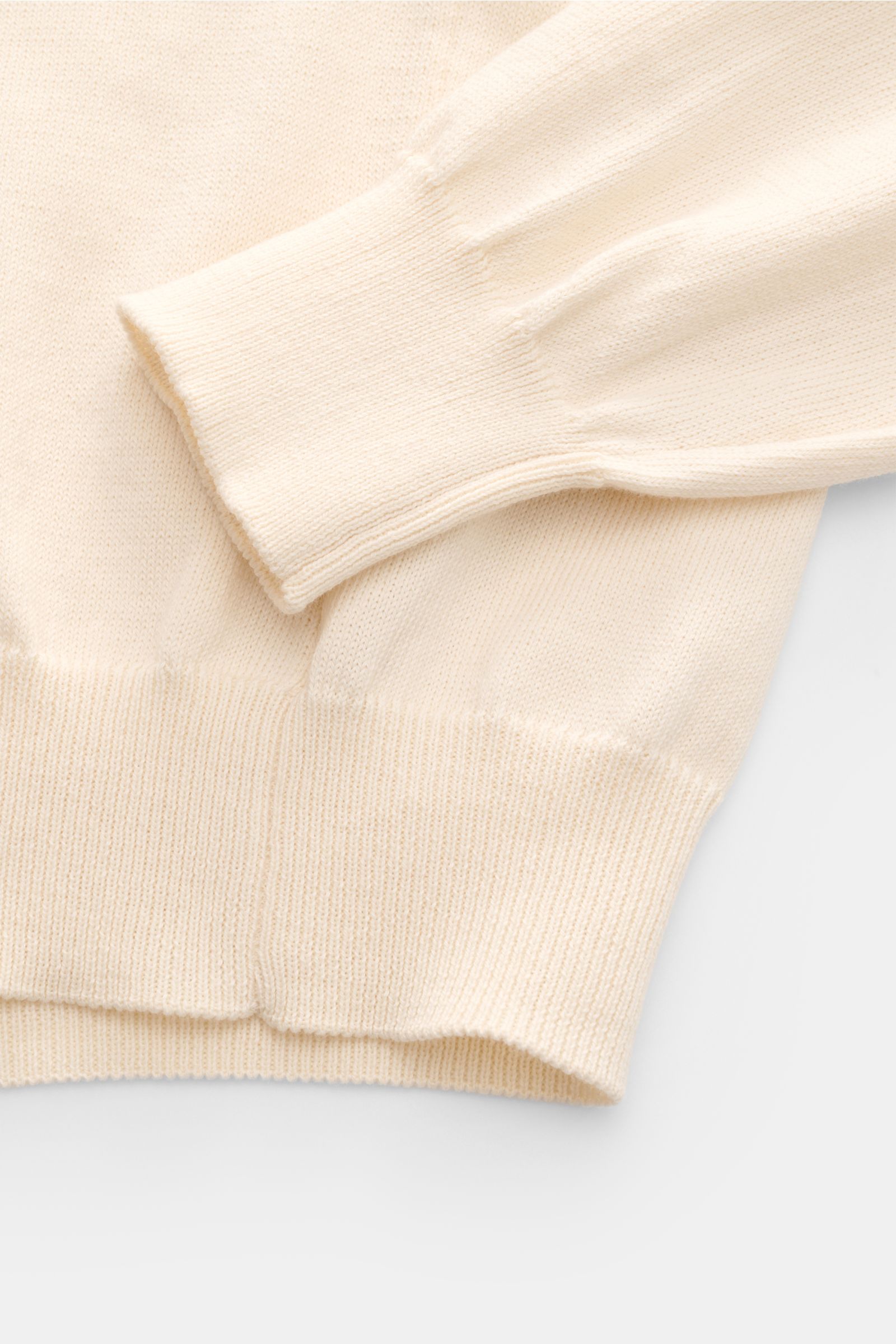 Close-up front view of B.F. Knitwear Crew neck jumper cream in pure cotton, showing fine knit, soft feel, slim fit, ribbed bands, and crew neck. 

Description: A versatile essential for spring: This crew neck jumper in pure cotton by B.F. KNITWEAR enha