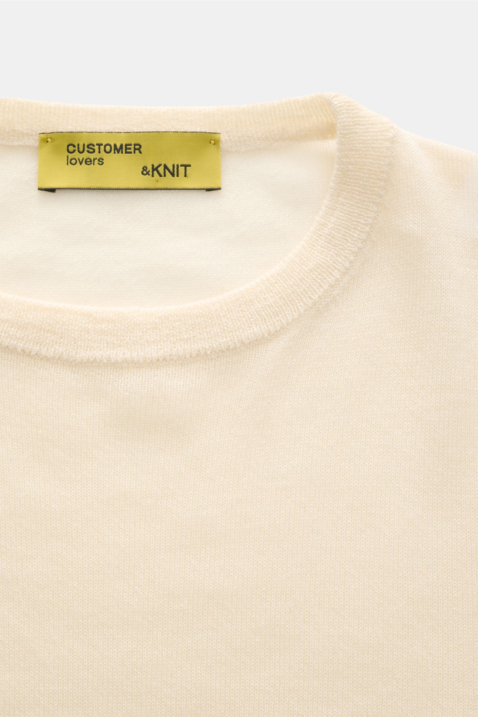 Close-up front view of B.F. Knitwear Cashmere crew neck jumper cream showing fine, airy knit and elasticated rib knit bands.

Lightweight summer cashmere from knitwear experts B.F. KNITWEAR: enhance your spring wardrobe with a durable, Italian-made mus