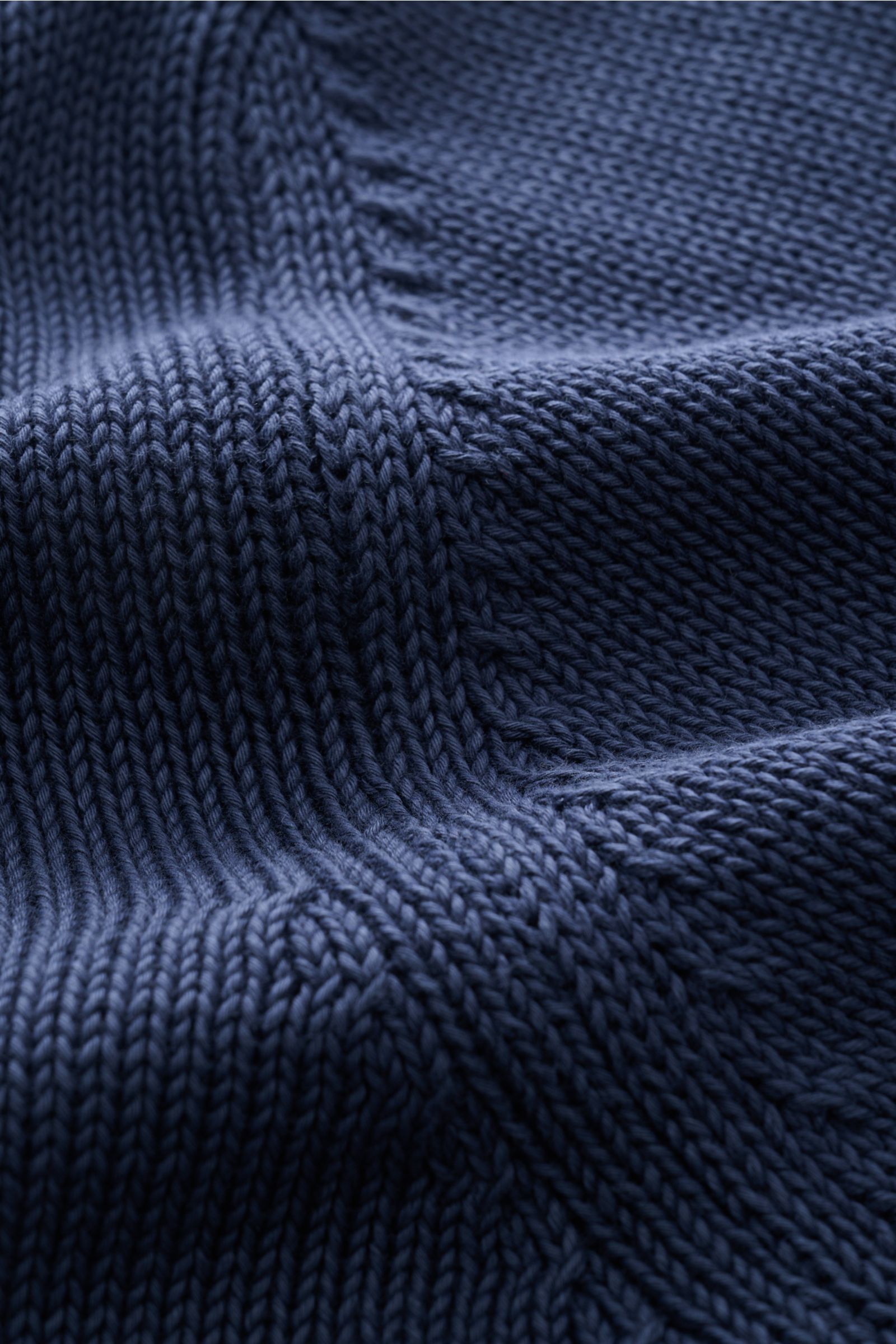 Close-up front view of Della Ciana Crew neck jumper dark blue showing soft, medium-fine pure Pima cotton knit texture with ribbed bands.

This elegant Italian cotton jumper by DELLA CIANA will enhance your spring wardrobe with its classic fit and can b