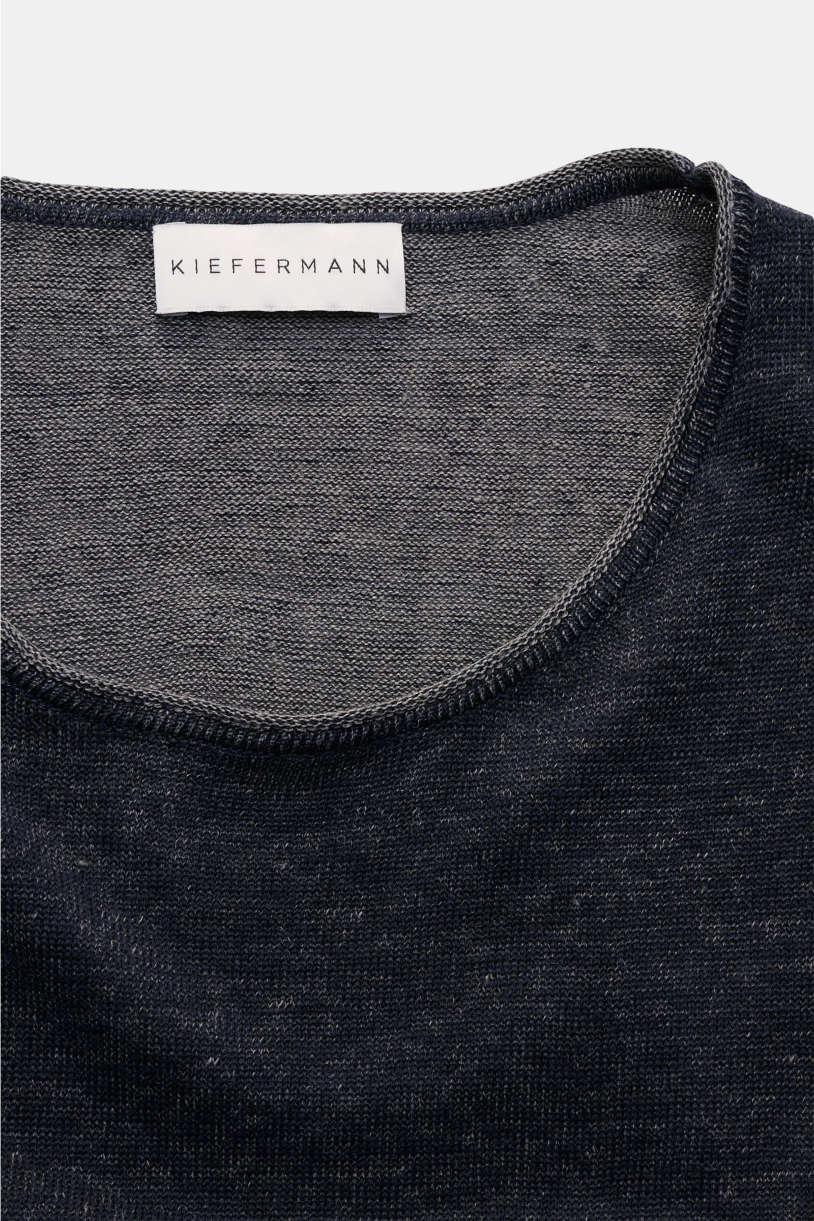 Close-up front view of the Kiefermann Crew neck jumper 'Jenario' navy mottled, showing fine knit pure linen fabric with slightly textured feel and crew neck. Ideal for summer temperatures and layering in the transitional period: The open texture of this j