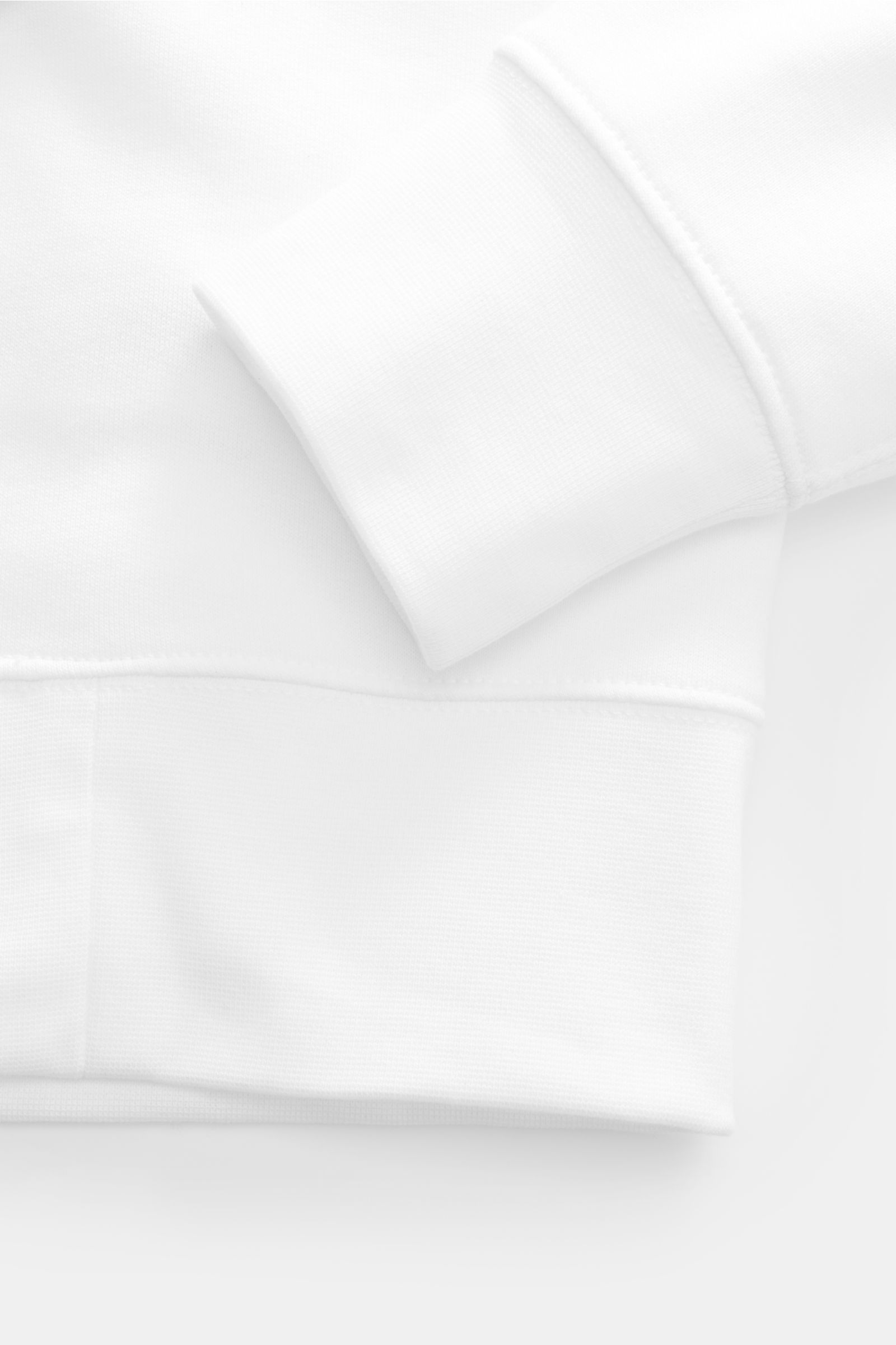 Close-up front view of Polo Ralph Lauren Sweatshirt white showing ribbed cuff and soft fabric texture.

The Polo Bear by POLO RALPH LAUREN is back and makes a fashion statement with a bike in casual look on this sweatshirt with softly brushed inside – 