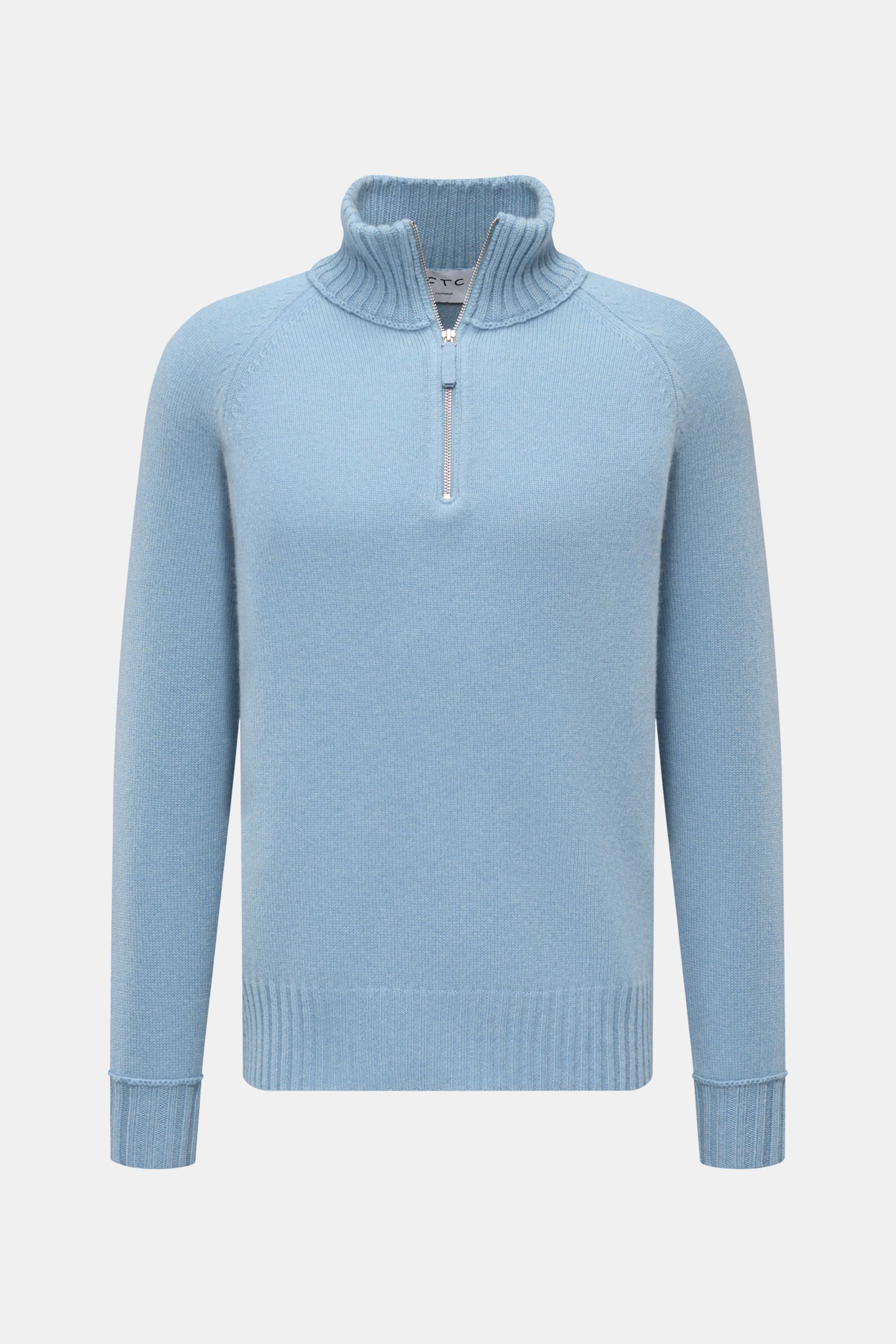 Front view of FTC Cashmere half-zip jumper light blue, slim fit with raglan sleeves, wide ribbed half-zip collar, rib knit cuffs, and hem.

Stay cosy and warm in the colder months with this timeless half-zip jumper by FTC made of high-quality Fair Trad