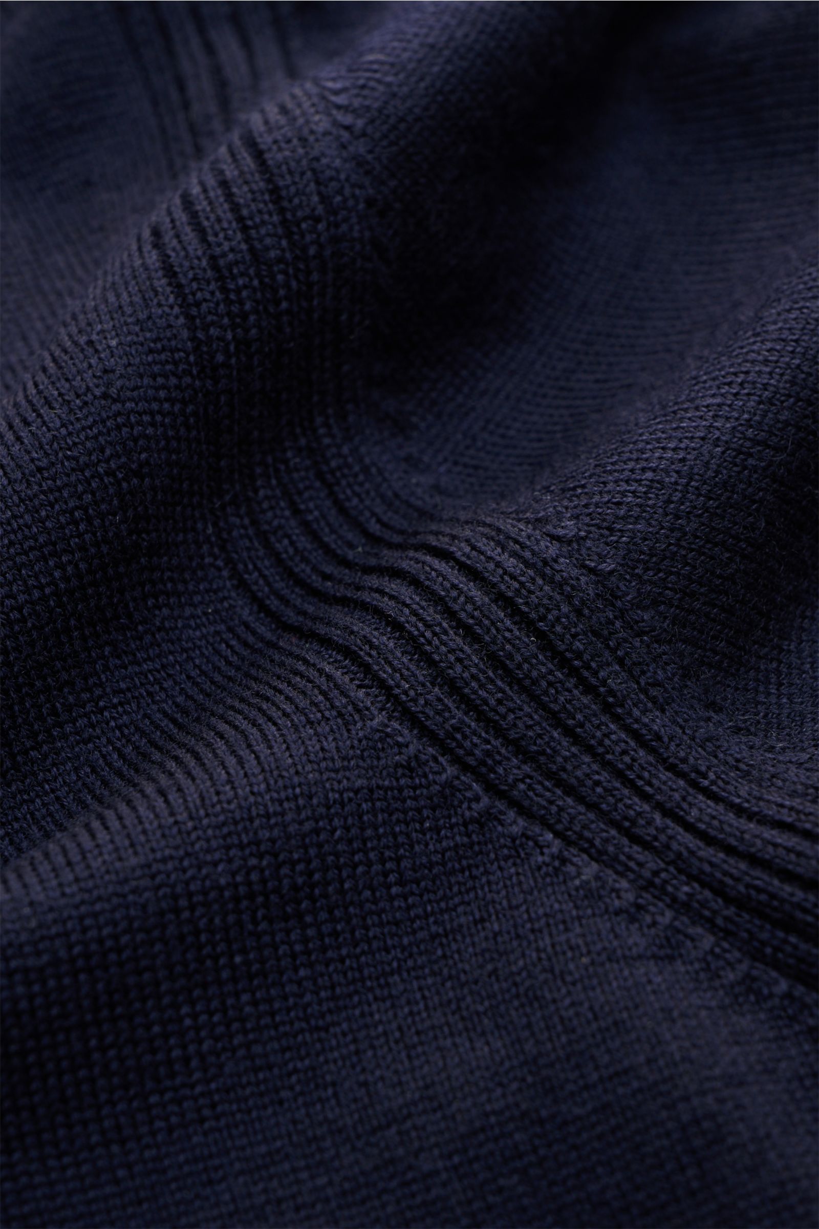 Close-up front view of Belstaff Knit polo 'Kyle' navy showing fine knit pure wool fabric with ribbed bands and zip collar.

Description: Polo look meets fine wool: Stylish casual looks are effortless with this knit polo by BELSTAFF.

Pure w