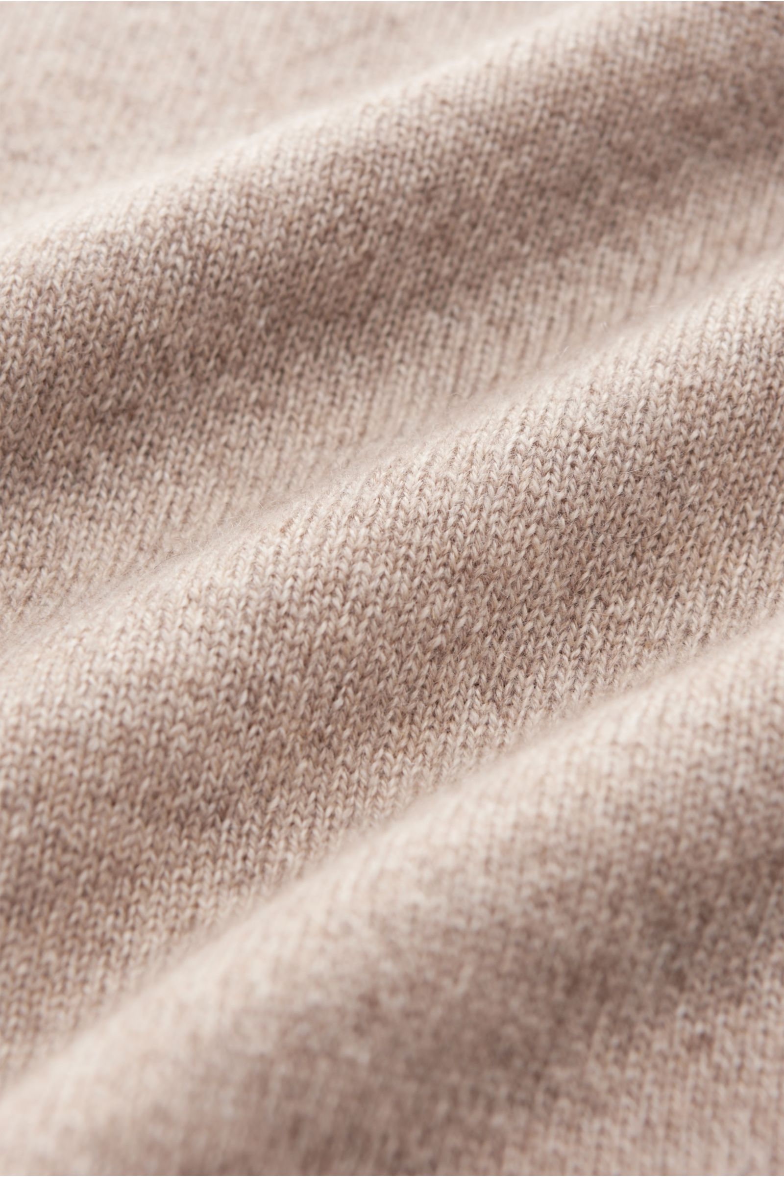 Close-up front view of von Braun Cashmere knit shirt beige showing fine knit texture and soft cashmere fabric.

Description: 
Luxurious winter essential: This VON BRAUN knit shirt in the finest Mongolian cashmere has a timeless design that offers versa