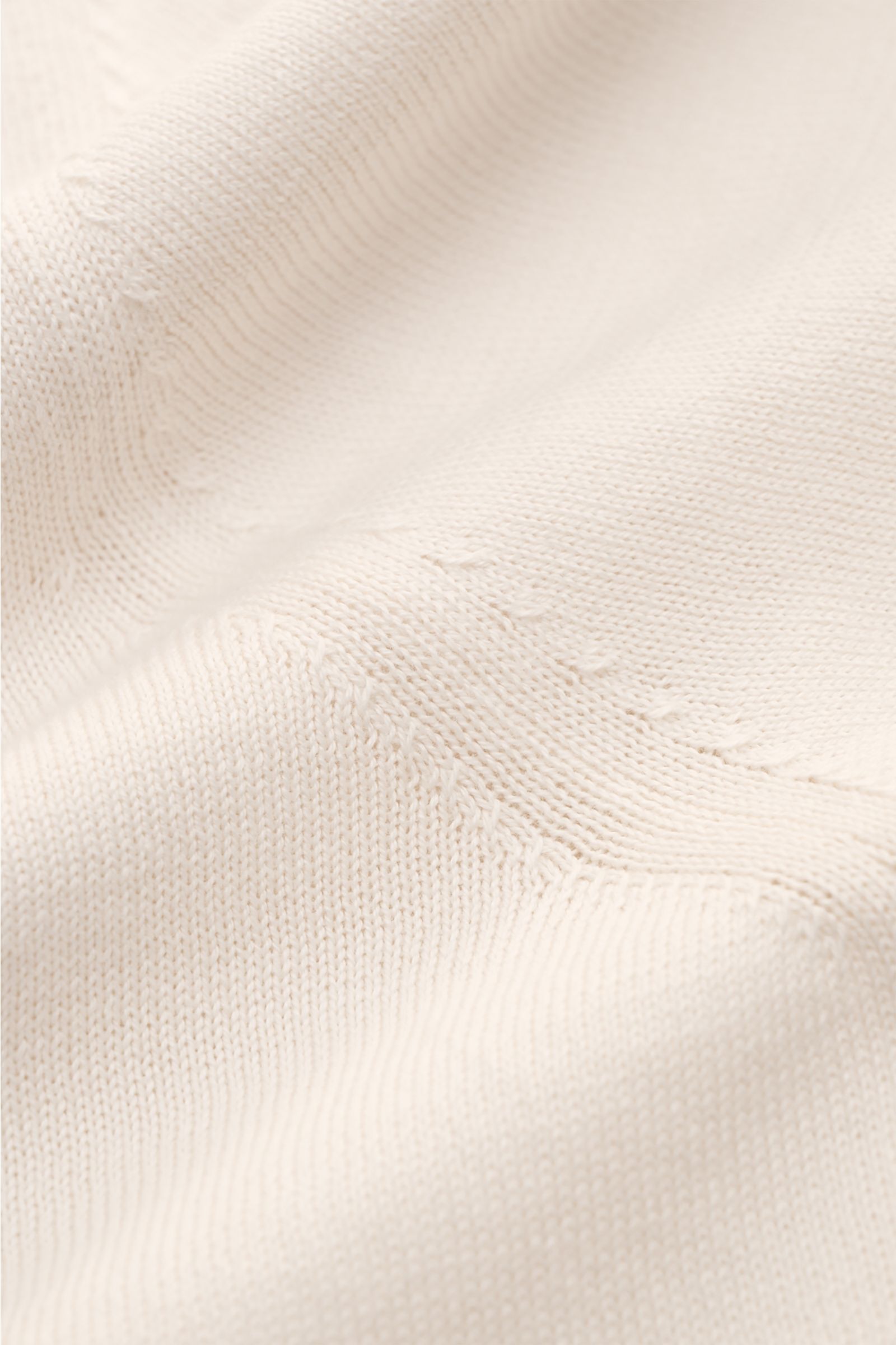 Close-up front view of Malo Short sleeve knit polo sand showing fine knit texture and soft pure cotton fabric.

An everyday essential: This short sleeve knit polo by MALO features soft pure cotton fabric and is a stylish part of modern looks.

