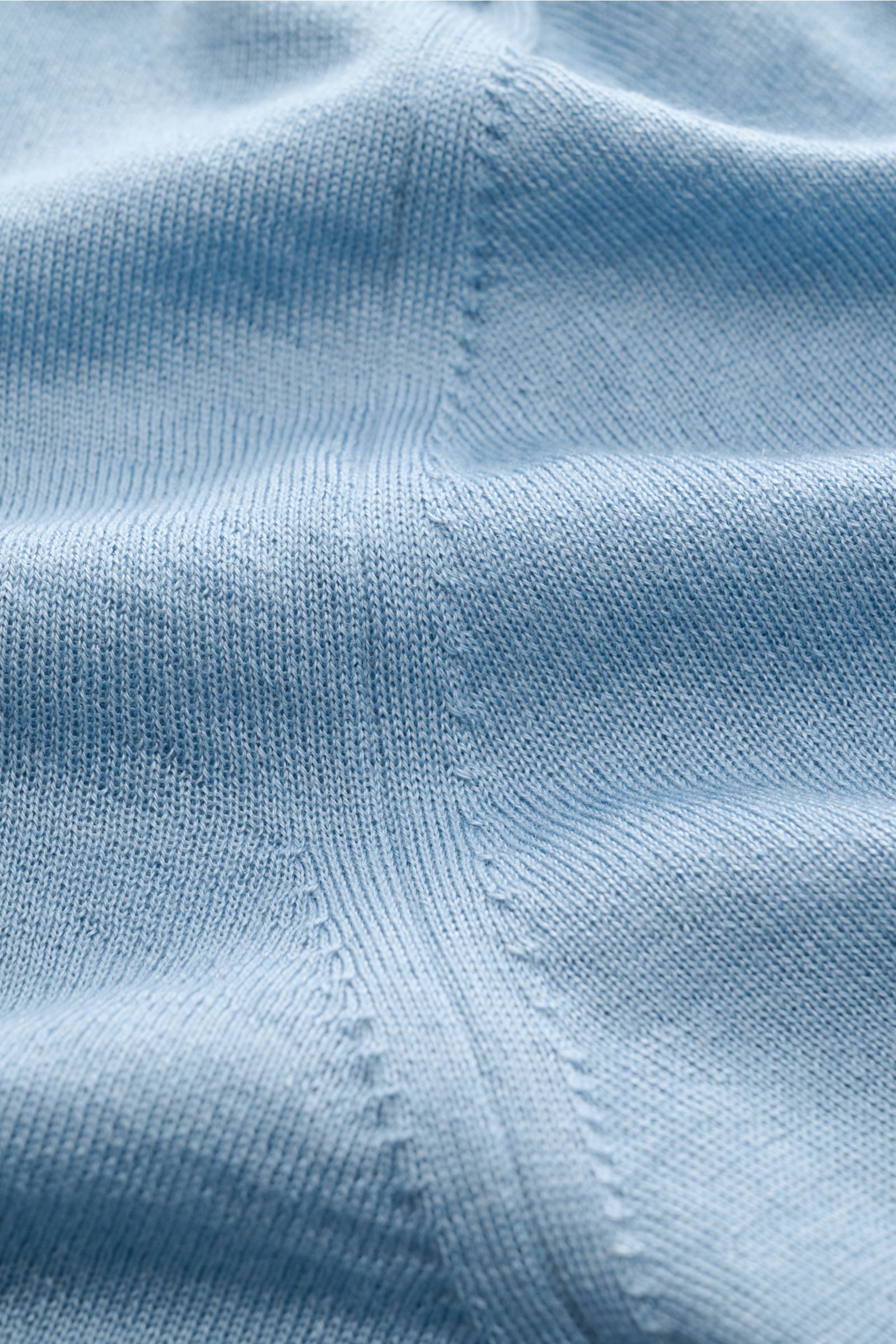 Close-up front view of Malo Knit polo smoky blue fabric showing fine knit texture and soft cashmere-silk blend.

An everyday essential: This soft knit polo by MALO is made of fine fabric in cashmere and silk – a stylish piece for classic looks.
