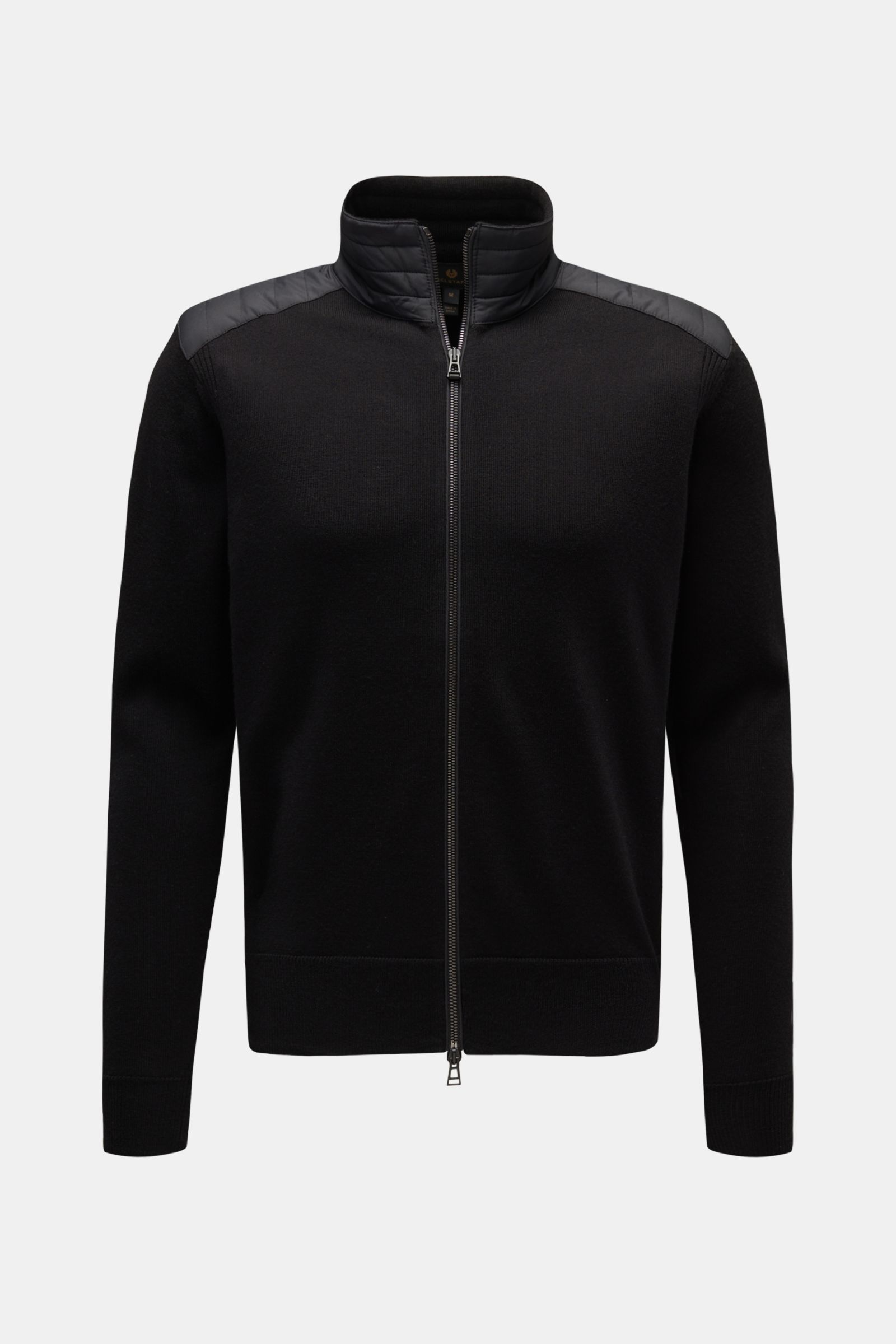 Front view of Belstaff Strickjacke 'Kelby' schwarz, a black wool cardigan with quilted shoulder and collar details, slim fit, two-way zipper, high stand collar, BELSTAFF label on upper arm, ribbed cuffs, and fine knit texture for biker style and comfort. 