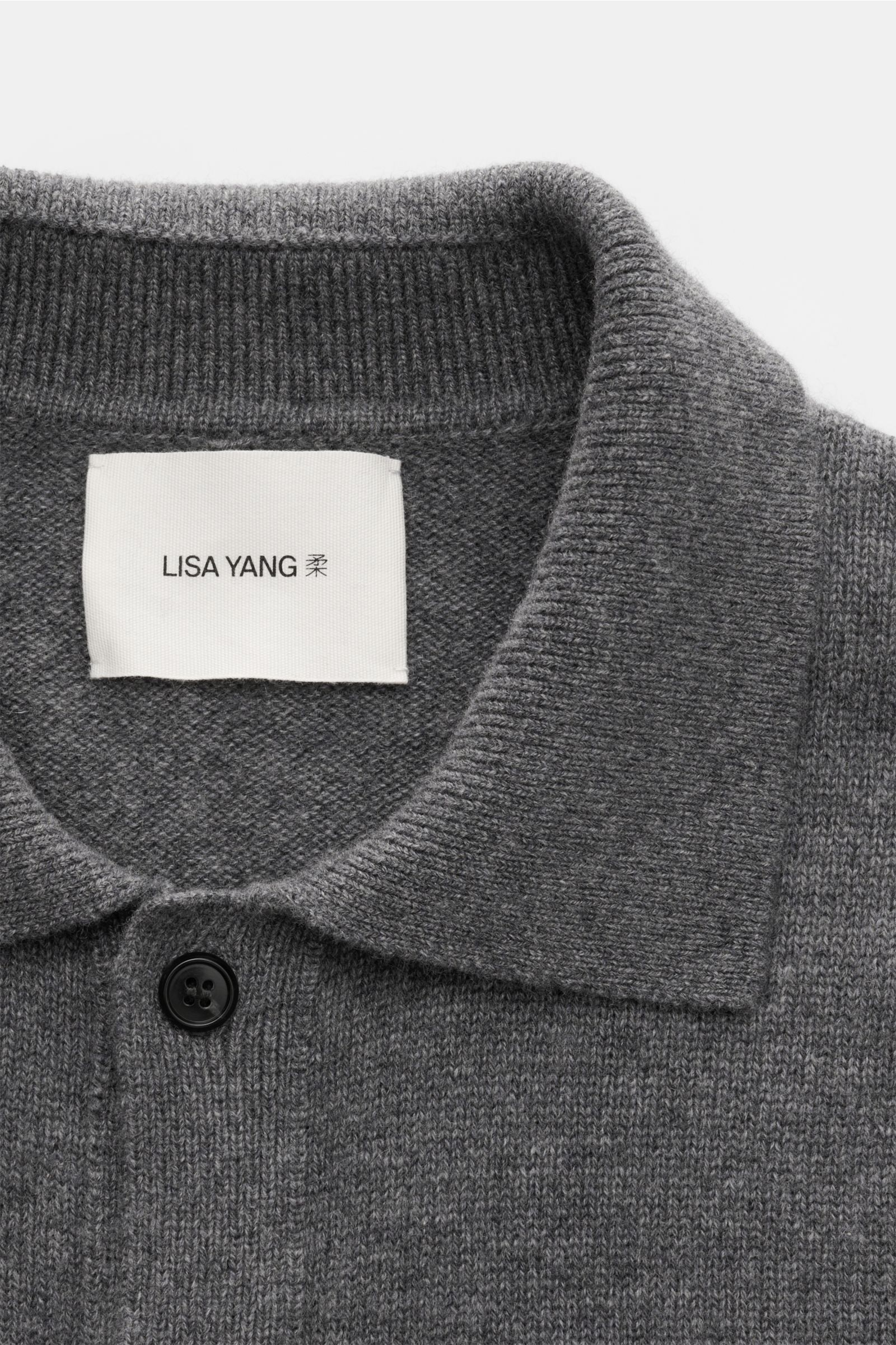 Close-up front view of Lisa Yang Cashmere cardigan 'Maximilian' grey melange showing knit collar, six-button placket, ribbed bands, and soft, medium-fine pure cashmere fabric. A modern essential for your wardrobe: With the LISA YANG label, you can always 