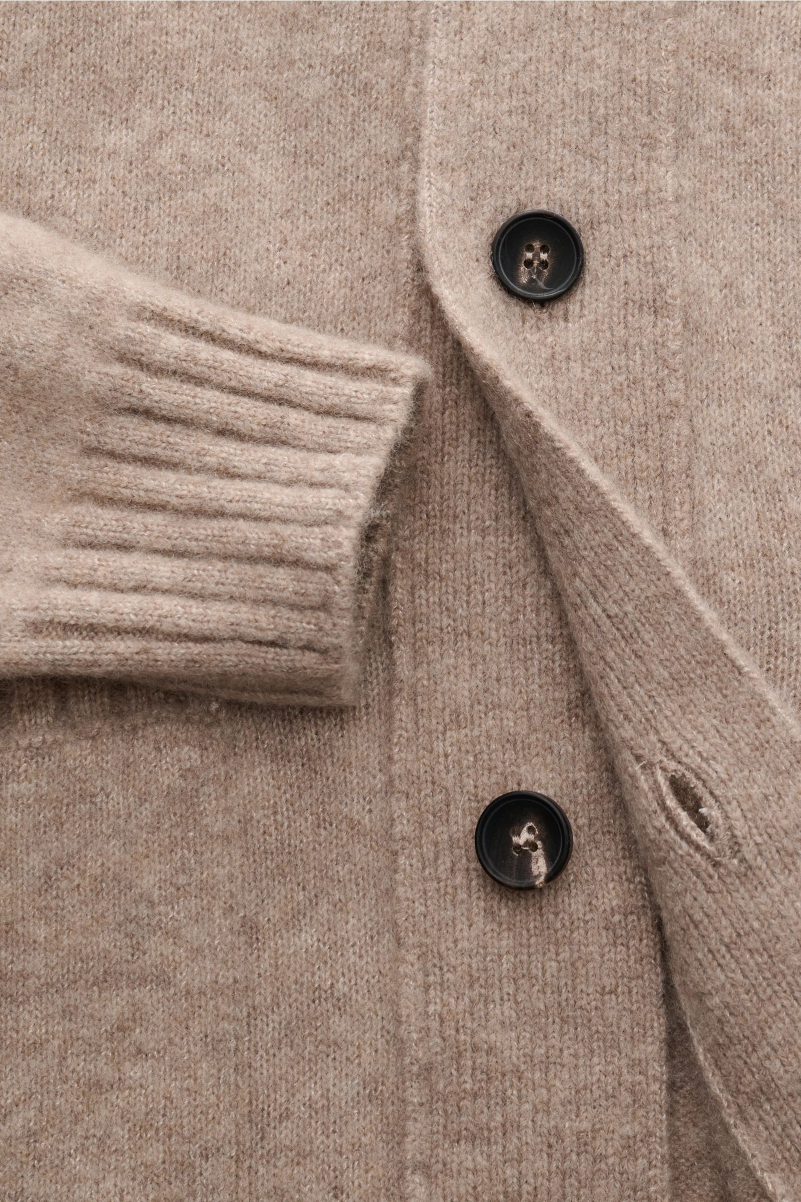 Close-up front view of Filippo de Laurentiis Cardigan beige mottled showing five-button placket, elasticated rib knit cuff, and soft medium-fine knit fabric.

Description: A soft, luxurious blend of cashmere, silk and high-quality microfibre makes this