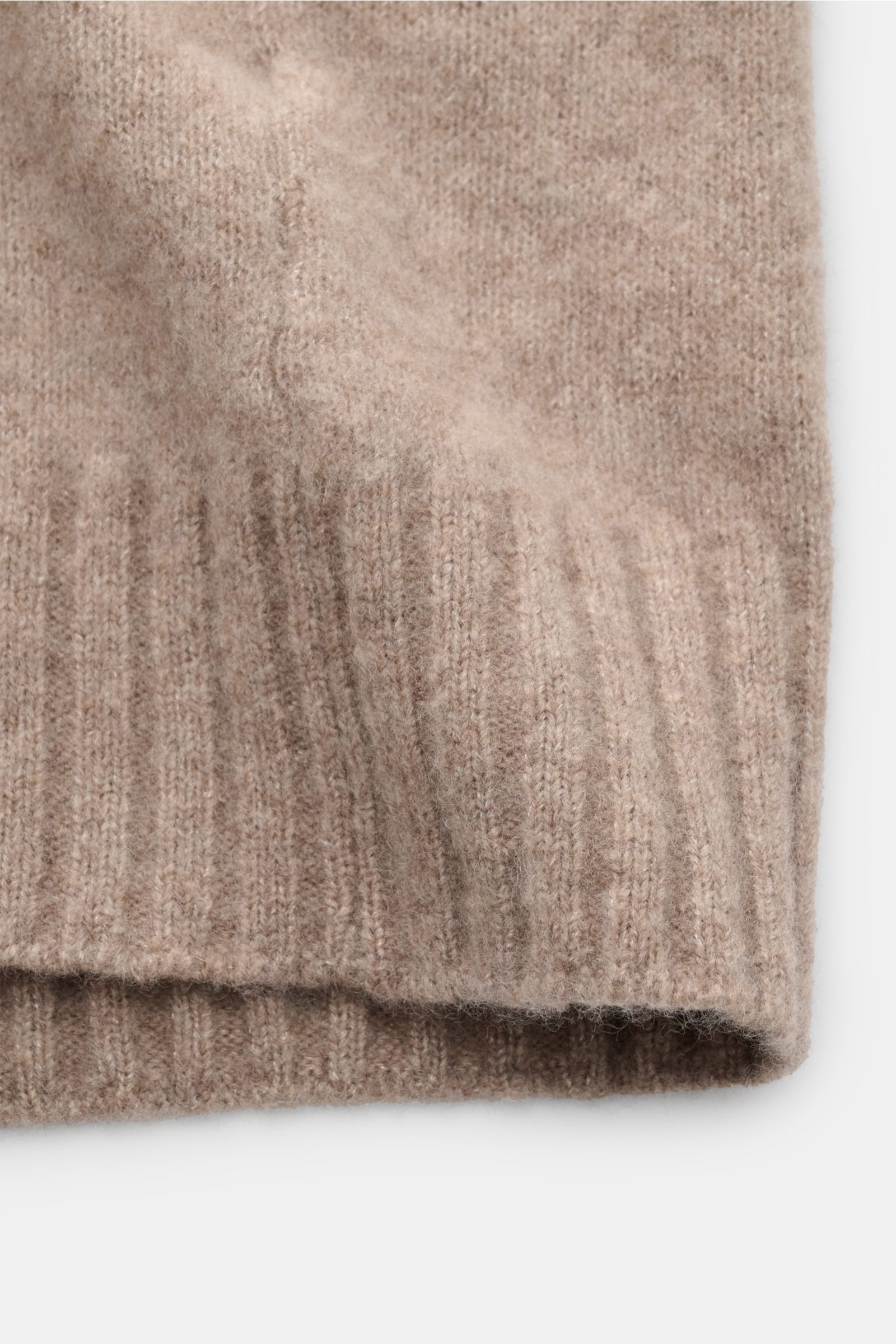Close-up front view of Filippo de Laurentiis Cardigan beige mottled showing soft, medium-fine knit ribbed elasticated hem.  
A soft, luxurious blend of cashmere, silk and high-quality microfibre makes this cardigan by FILIPPO DE LAURENTIIS your new fav